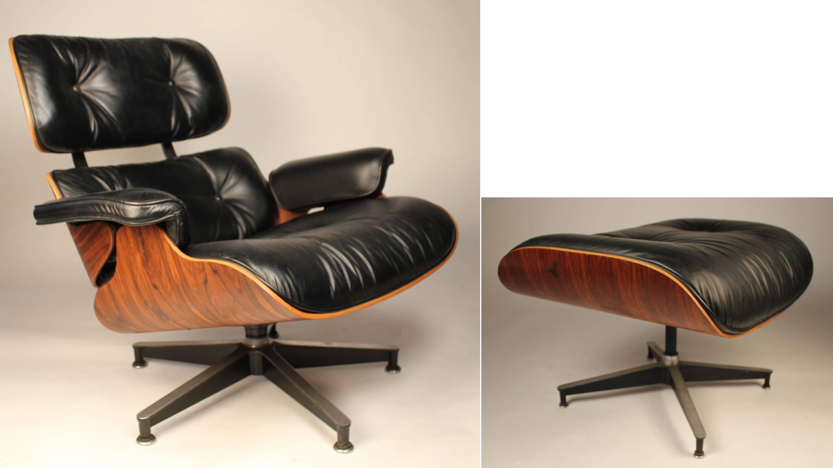 A very clean example of a vintage modern icon. Charles Eames 670 & 671 Lounge chair and ottoman produced by Herman Miller. All intact and all original. Beautiful striations in the Brazilian Rosewood graining. A great example and yes, they are as