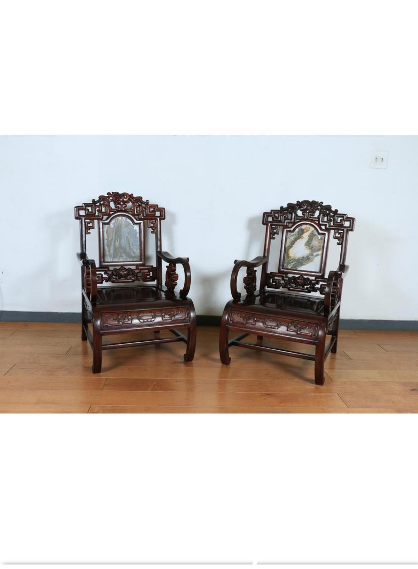 Rosewood Chinese Chairs. These rosewood chairs are styled as china chairs. The back part of the chairs are marble and are very heavy.