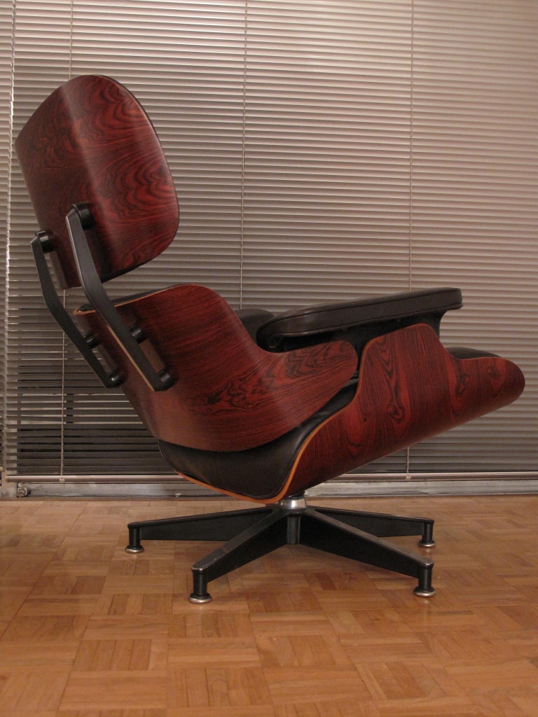 Vintage Rosewood Eames Lounge Chair and Ottoman at 1stDibs