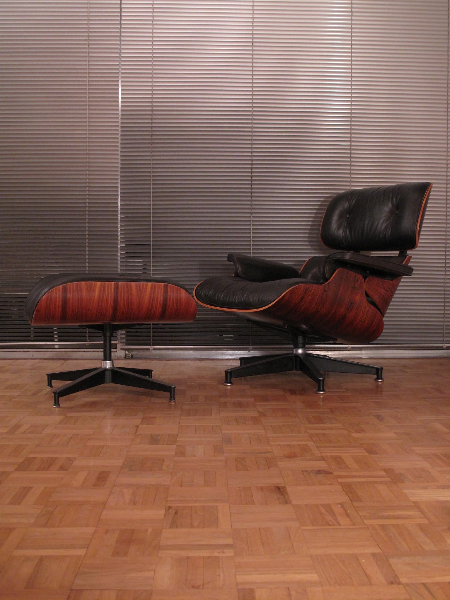 A wonderful Brazilian rosewood and black leather chair and footstool produced by Herman Miller. This chair was purchased from the original owner who bought it new in the mid-late 1970s.

The chair has been very well cared for over the years and is