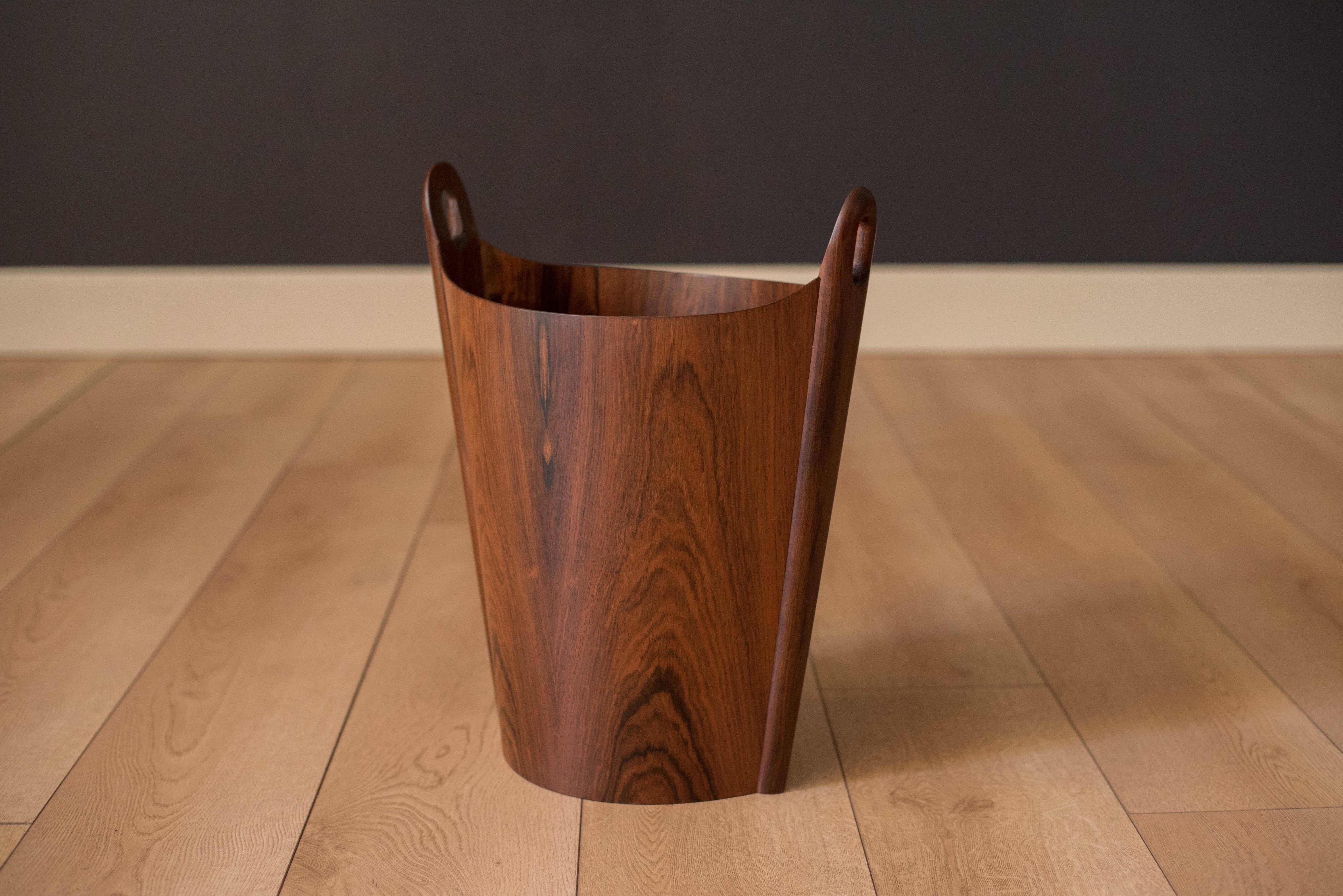 Mid century waste paper bin designed by Einar Barnes for P.S. Heggen in Brazilian rosewood, Norway. This collectible piece features sculptural handles and a clean interior. Marked on the bottom.
 


Offered by Mid Century Maddist