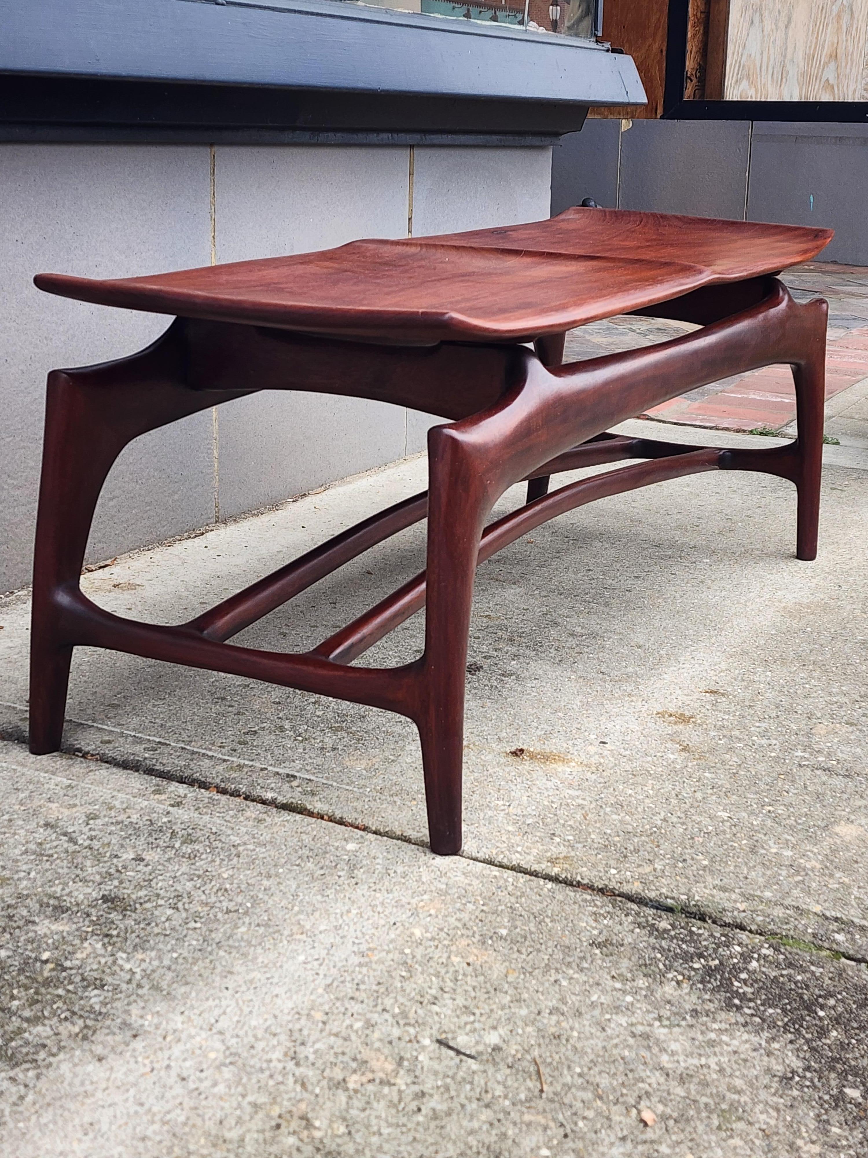 Stunning artisan solid rosewood bench/coffee table that is simply gorgeous.    The curves and attention to detail are top notch, I'm guessing this was made in the early to mid 1990s.  All studio made with incredible joinery and construction.   All