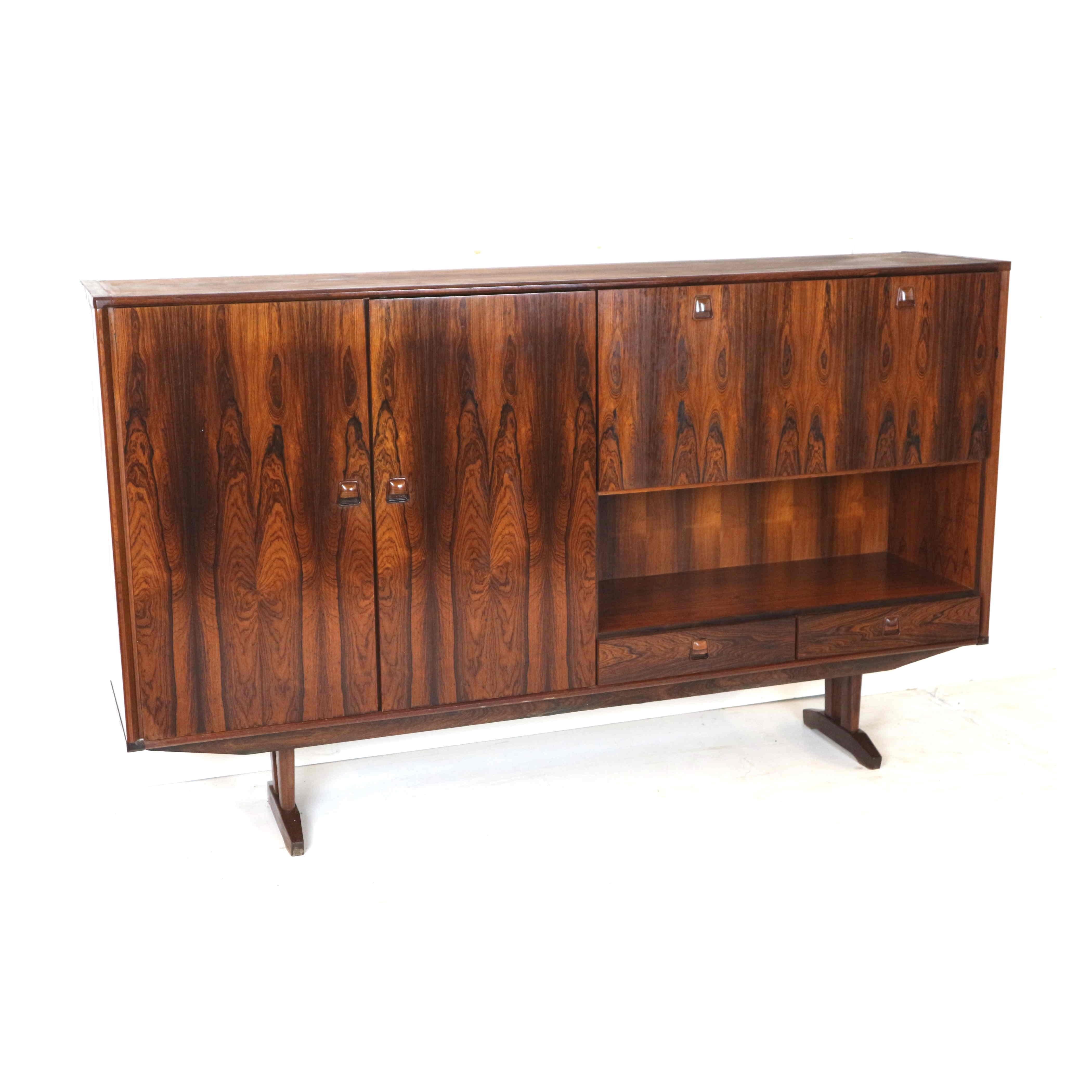 Vintage rosewood sideboard highboard from Topform made in the 60s.

Dimensions:
Width: 202 cm
Depth: 42.2
Height: 120.5 cm

The case has minor signs of use appropriate to its age. See the photos for this.