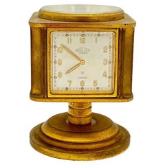 Orologio da tavolo rotante vintage con strumenti meteo