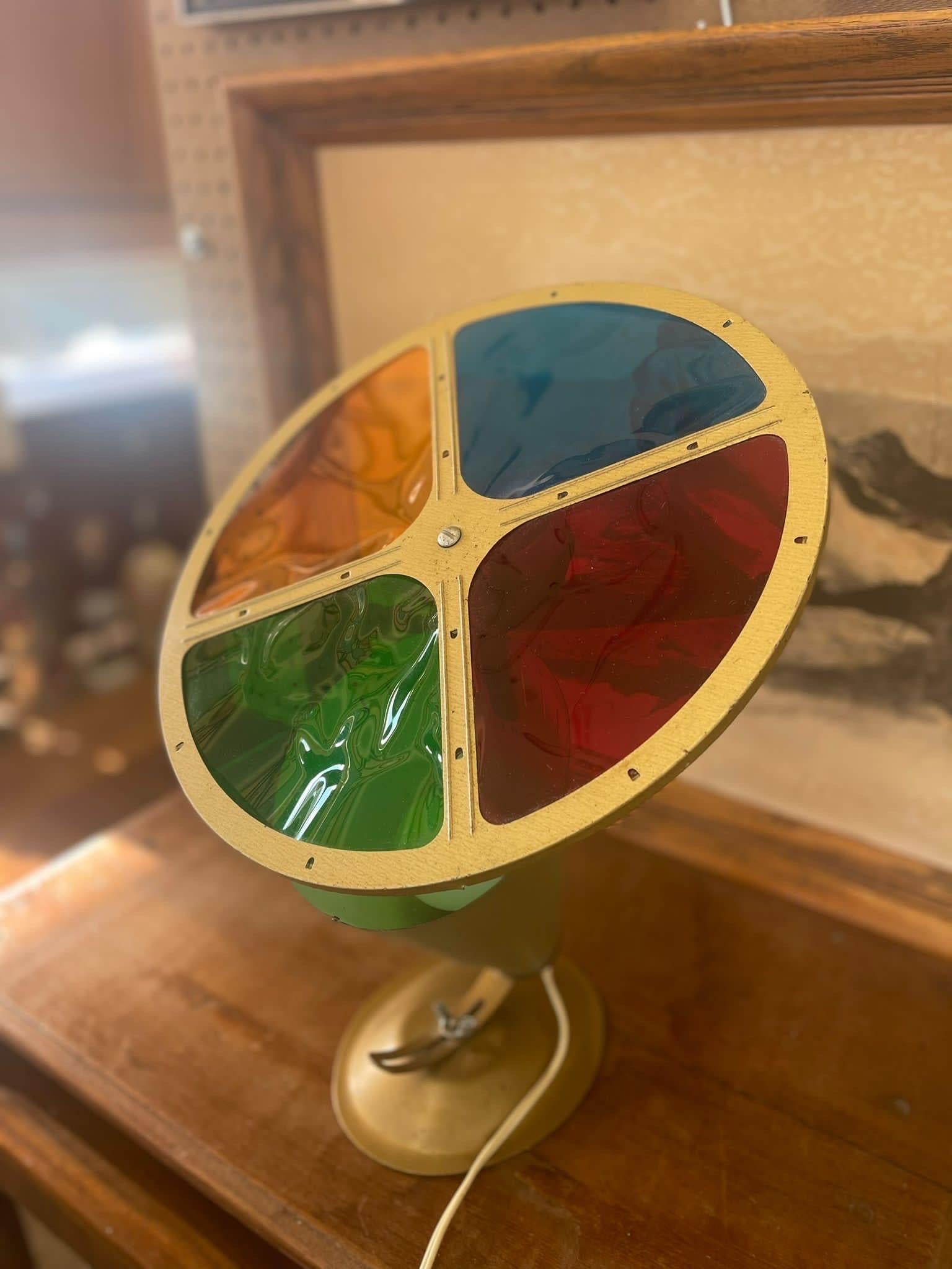 Vintage Rotating Projector Lamp Commonly used to Illuminate Christmas Trees. Rotates through Primary Colors to Light up a Room. Fully Functional. Vintage Condition Consistent with Age as Pictured.

Dimensions. 13 Diameter ; 16 H