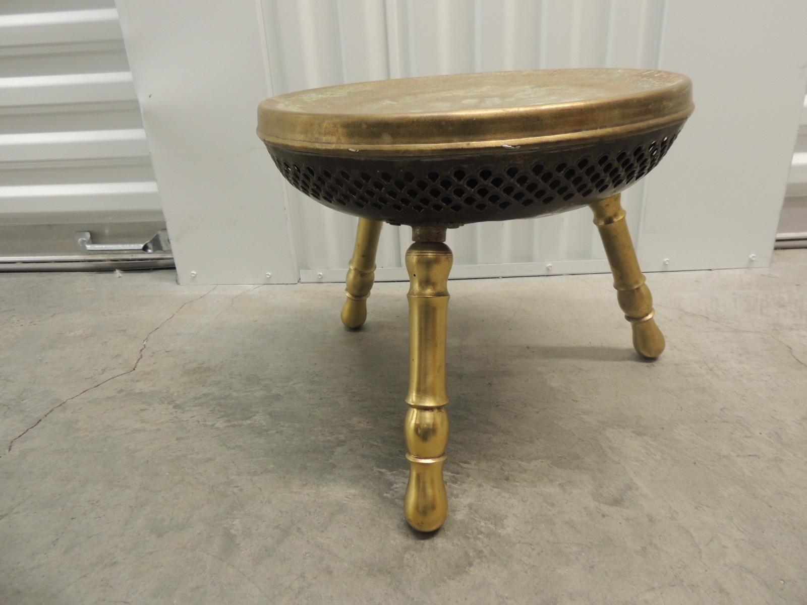 Vintage round brass Indian stool with tripod legs.
The legs unscrew from the top. Reposse style top.
Size: 14 x 12