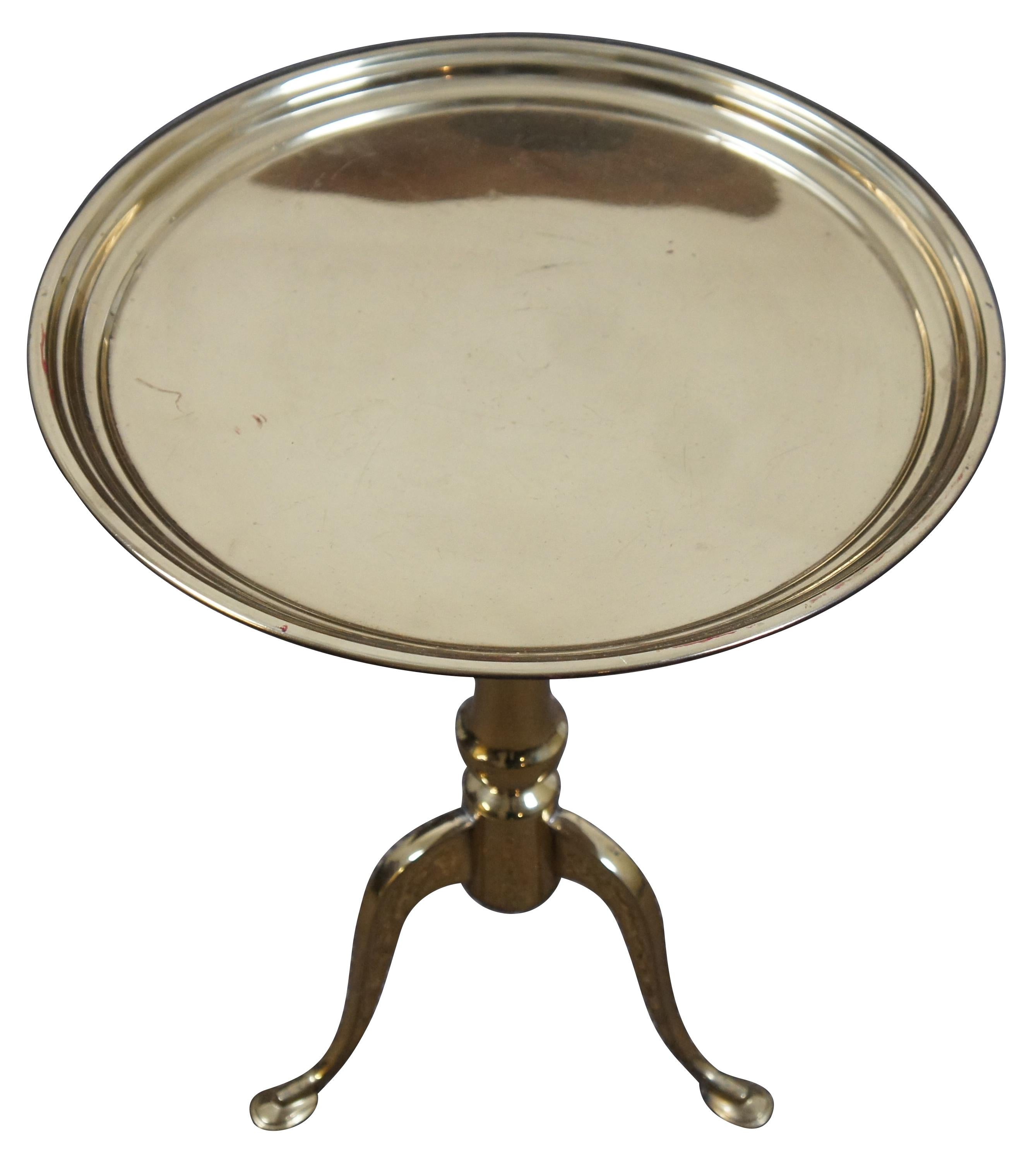 Vintage late 20th century round brass butler tray table or plant stand with raised edge around the top, turned pedestal base and three cabriole feet.  42-1533.