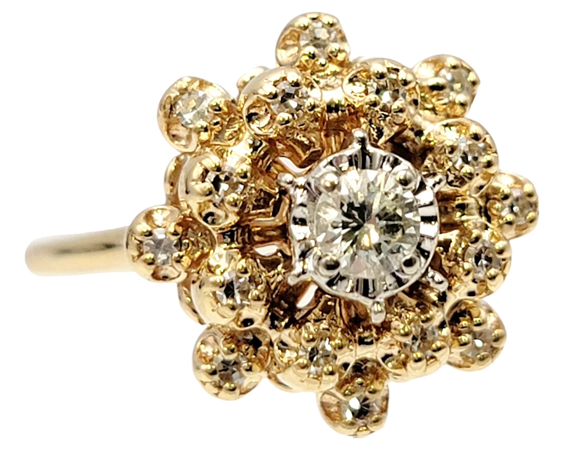 Ring size: 6.25

Lovely vintage diamond dome ring bursting with sparkle! It features 17 round brilliant and single cut diamonds stacked in a rounded dome shape, with the largest stone at the center of the piece. The diamonds are prong set in yellow