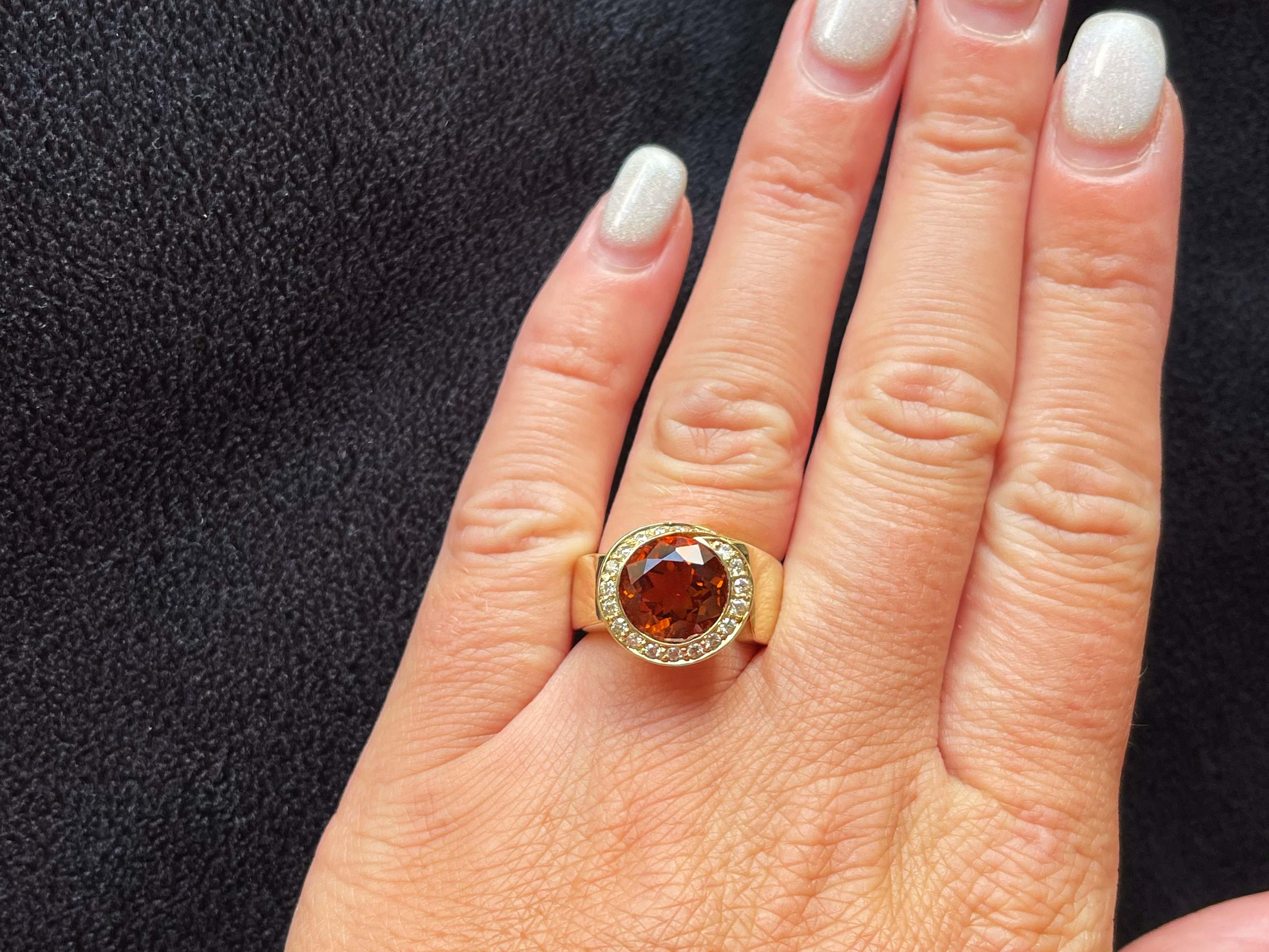 Item Specifications:

Metal: 14k Yellow Gold

Style: Statement Ring

Ring Size: 6.25 (resizing available for a fee)

Total Weight: 9.7 Grams

Gemstone Specifications: Citrine 
​
​Citrine Gemstone Measurements: 10.7 mm x 10.2 mm x 6.6 mm 

Citrine