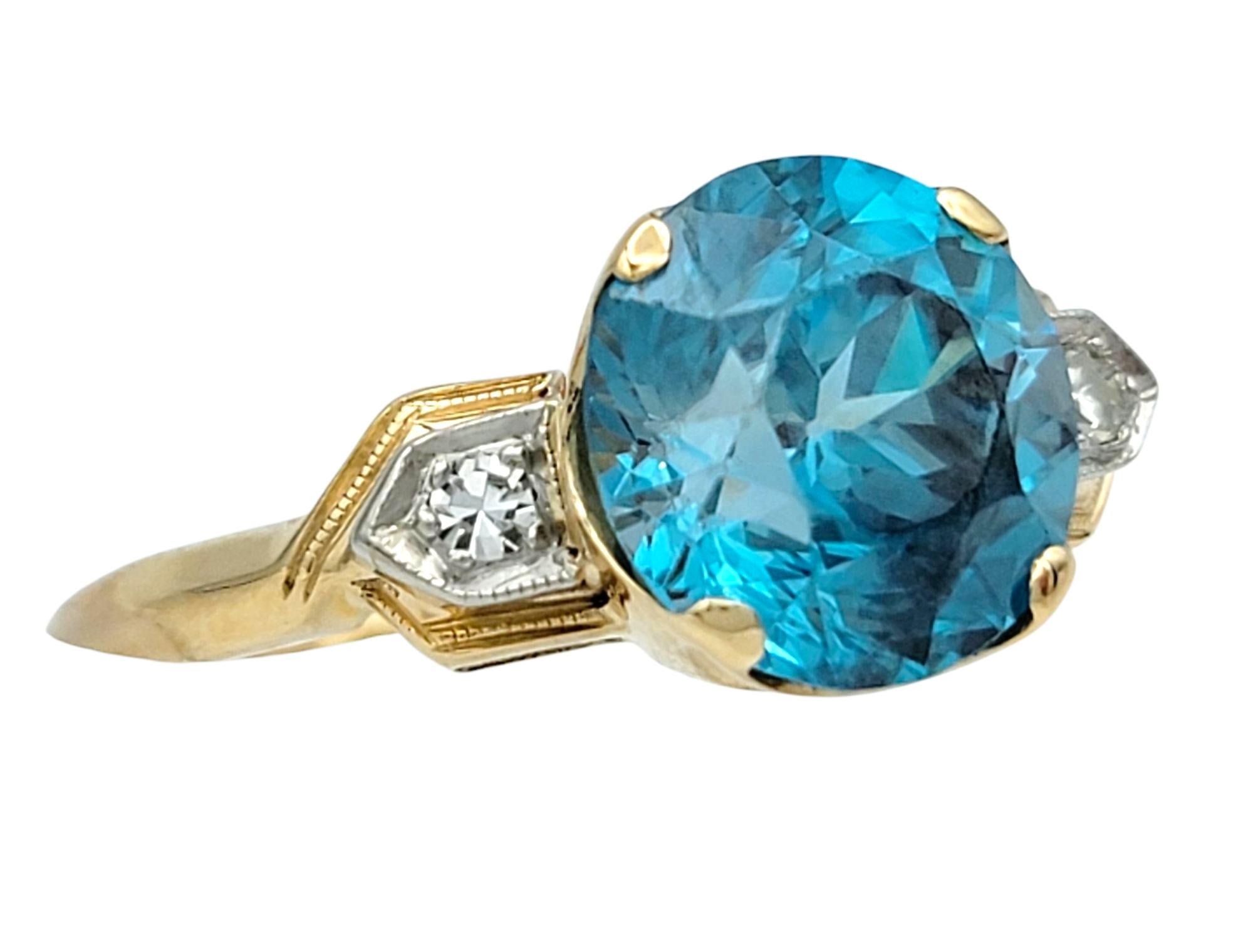 Contemporary Vintage Round Cut Blue Zircon and Diamond Three-Stone Ring 14 Karat Yellow Gold For Sale