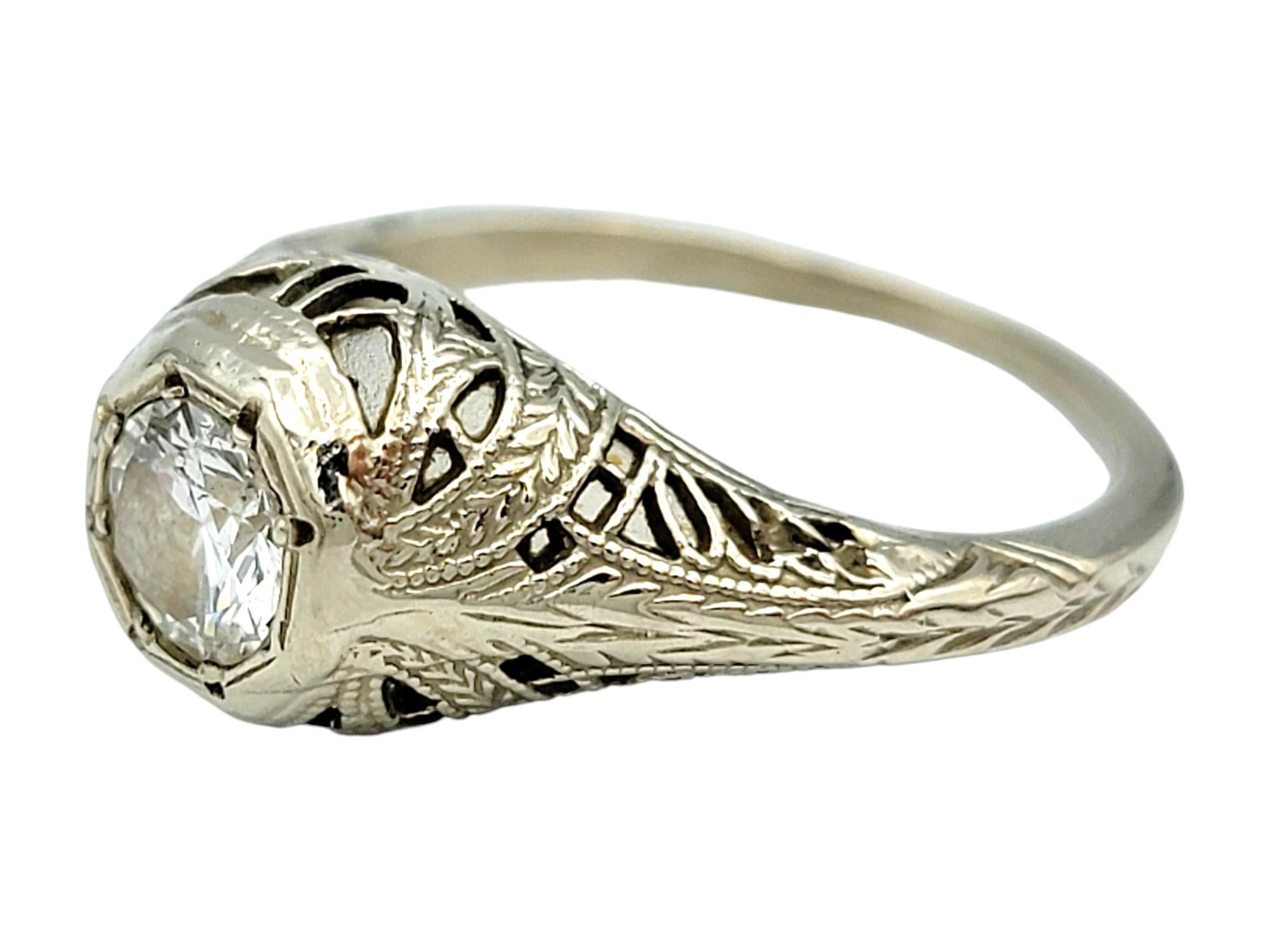 Vintage Round Cut Diamond Solitaire Filigree Ring in 14 Karat White Gold In Good Condition For Sale In Scottsdale, AZ