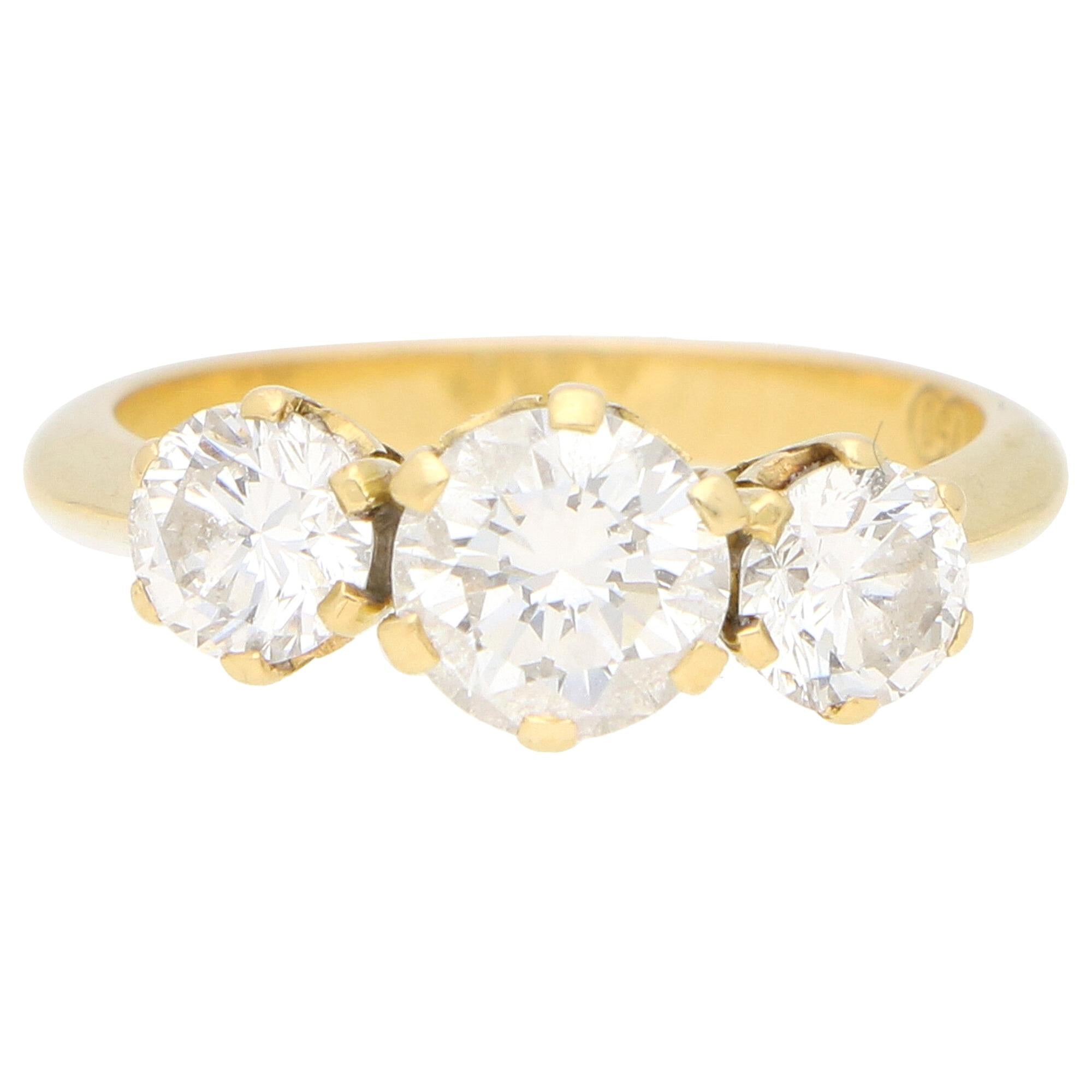 Vintage Round Cut Diamond Three Stone Engagement Ring Set in 18k Yellow Gold