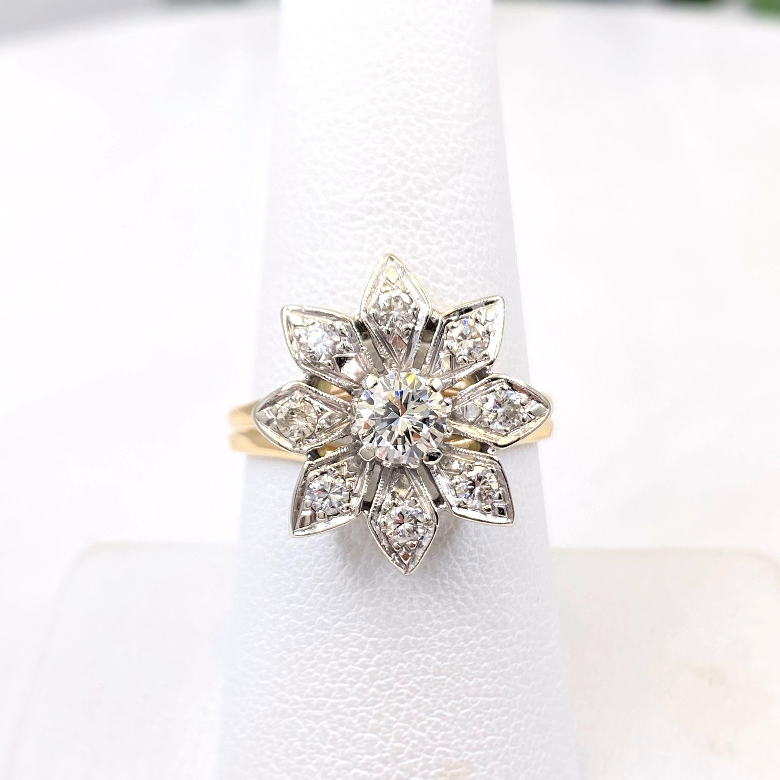 Vintage 8 Petal Flower Diamond Ring
Metal:   14kt White and Yellow Gold
Size:  8 - sizable
Main Diamond:  Round Brilliant Diamond 0.43 cts 
Color & Clarity:  K color, VS2 clarity
Accent Diamonds:  8 Round Diamonds on each petal 0.44 tcw with