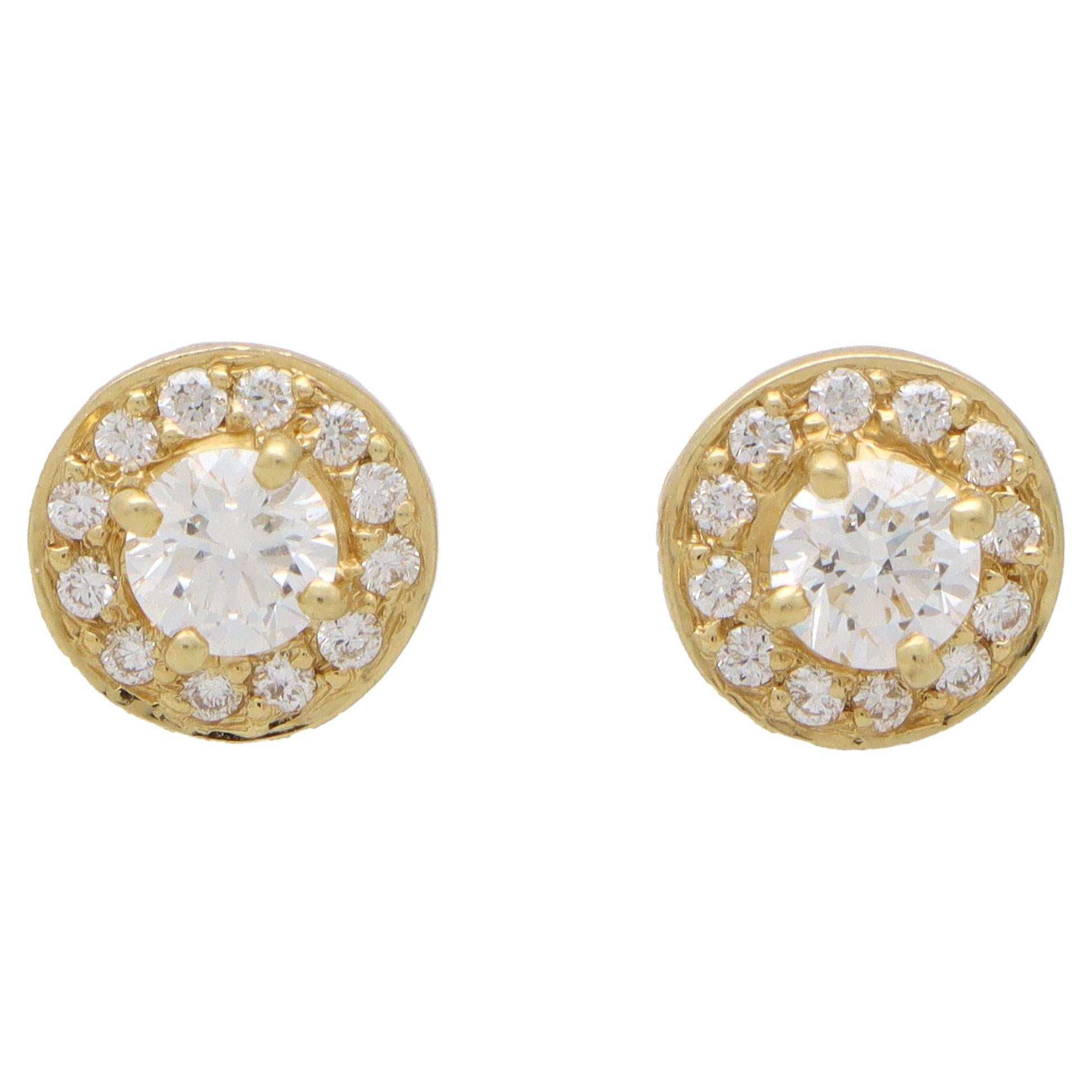 Fancy Light Yellow Round Diamond Stud Earrings with White Diamond Halo