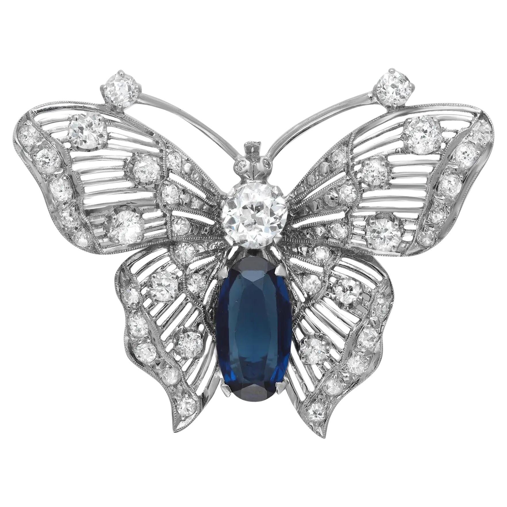 Vintage Round Diamond & Synthetic Blue Sapphire Butterfly Brooch 14K White Gold For Sale