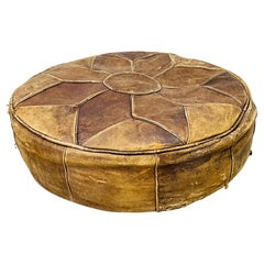 Hassock rotondo vintage in pelle invecchiata