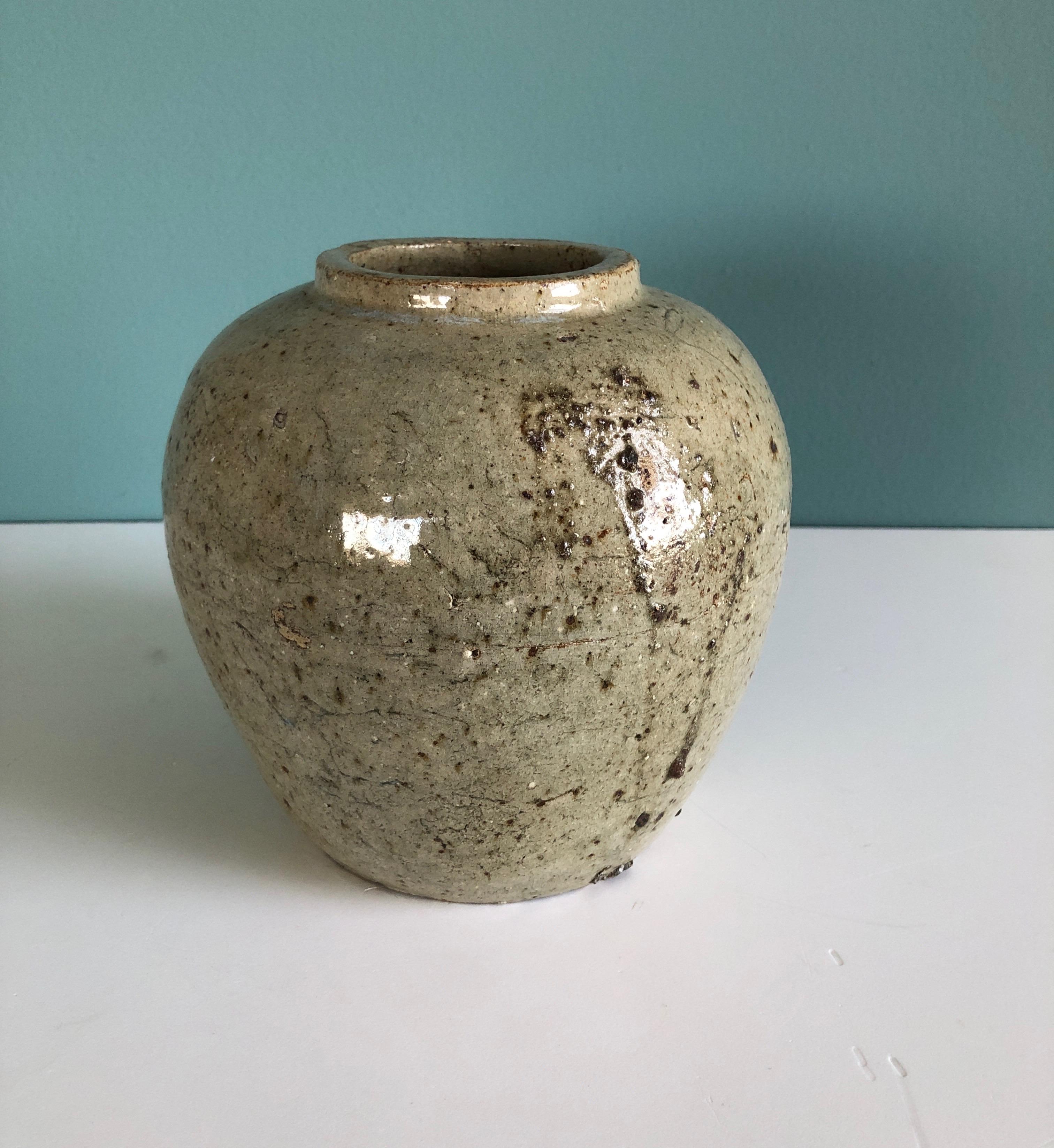 Vintage round glazed Asian vase.
Size: 6.5”D x 6.5”H.