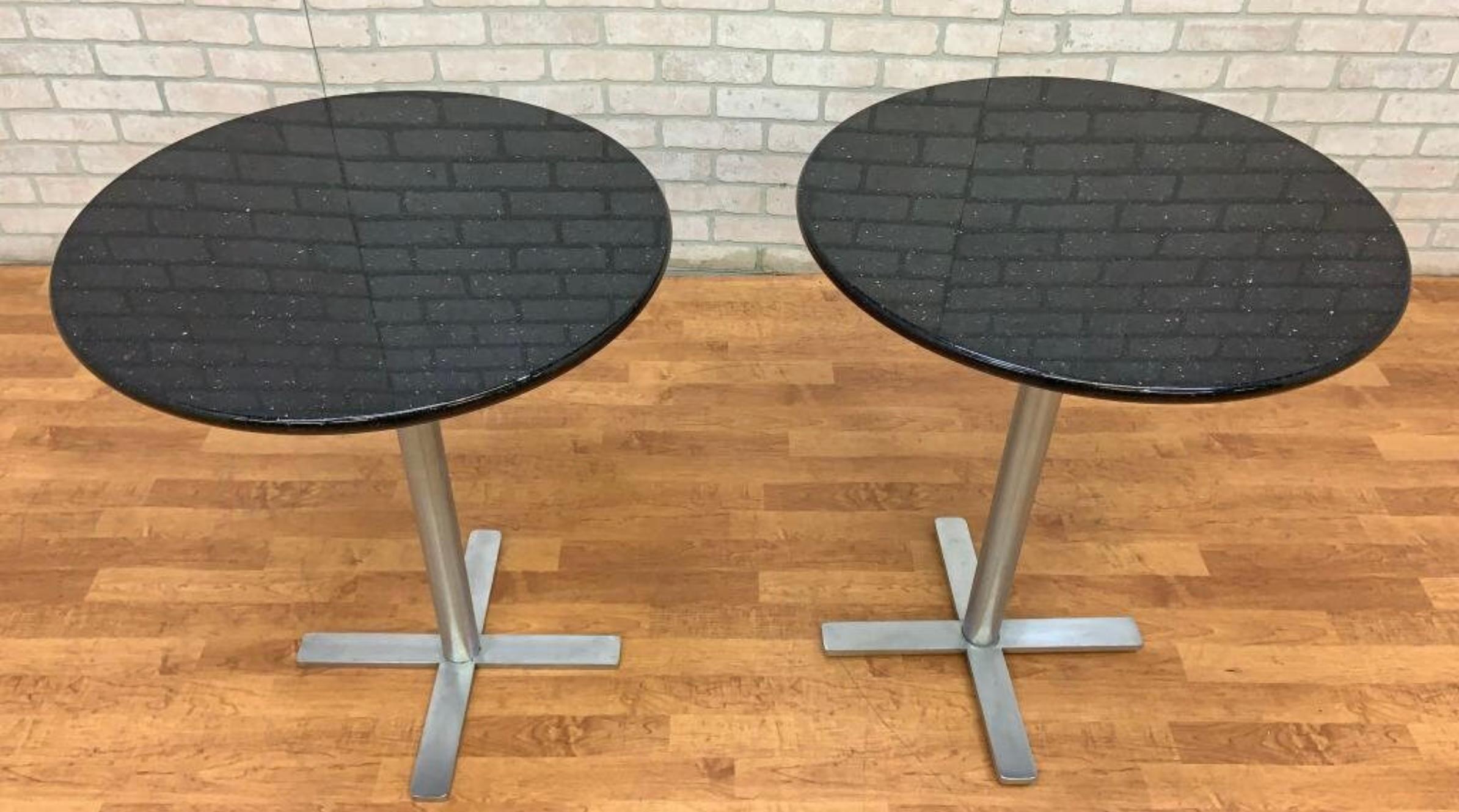Vintage Round Granite Top Bistro Side Tables - Pair

Vintage pair of modern round granite top polished tops with steel bases bistro side tables.  

Circa: 1990s

Dimensions:

W: 24