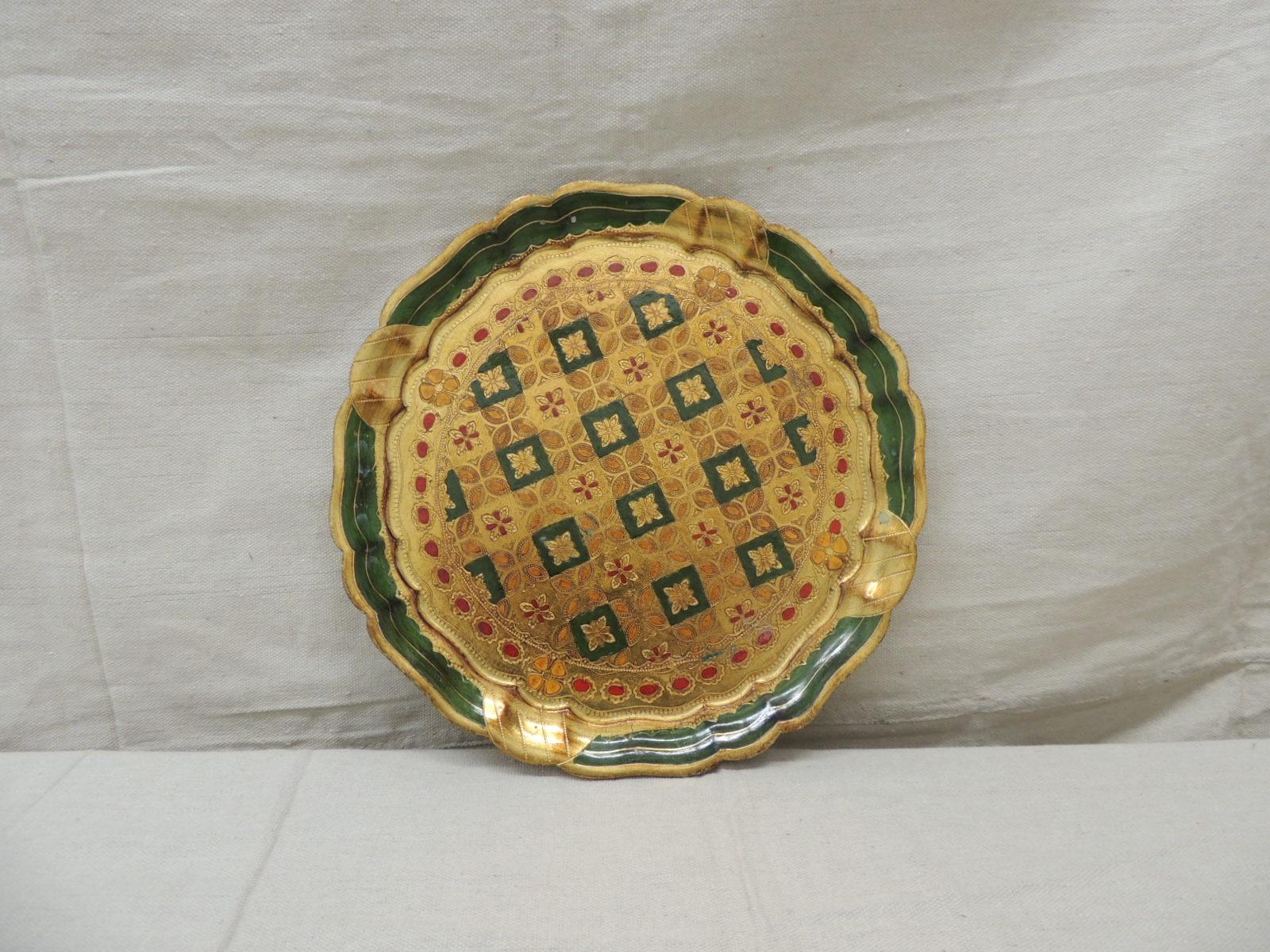 Vintage round green and gold Florentine serving tray
Stamped: C & R Florence.
Scalloped edges
Size: 11.75” D x 0.5” H.
 