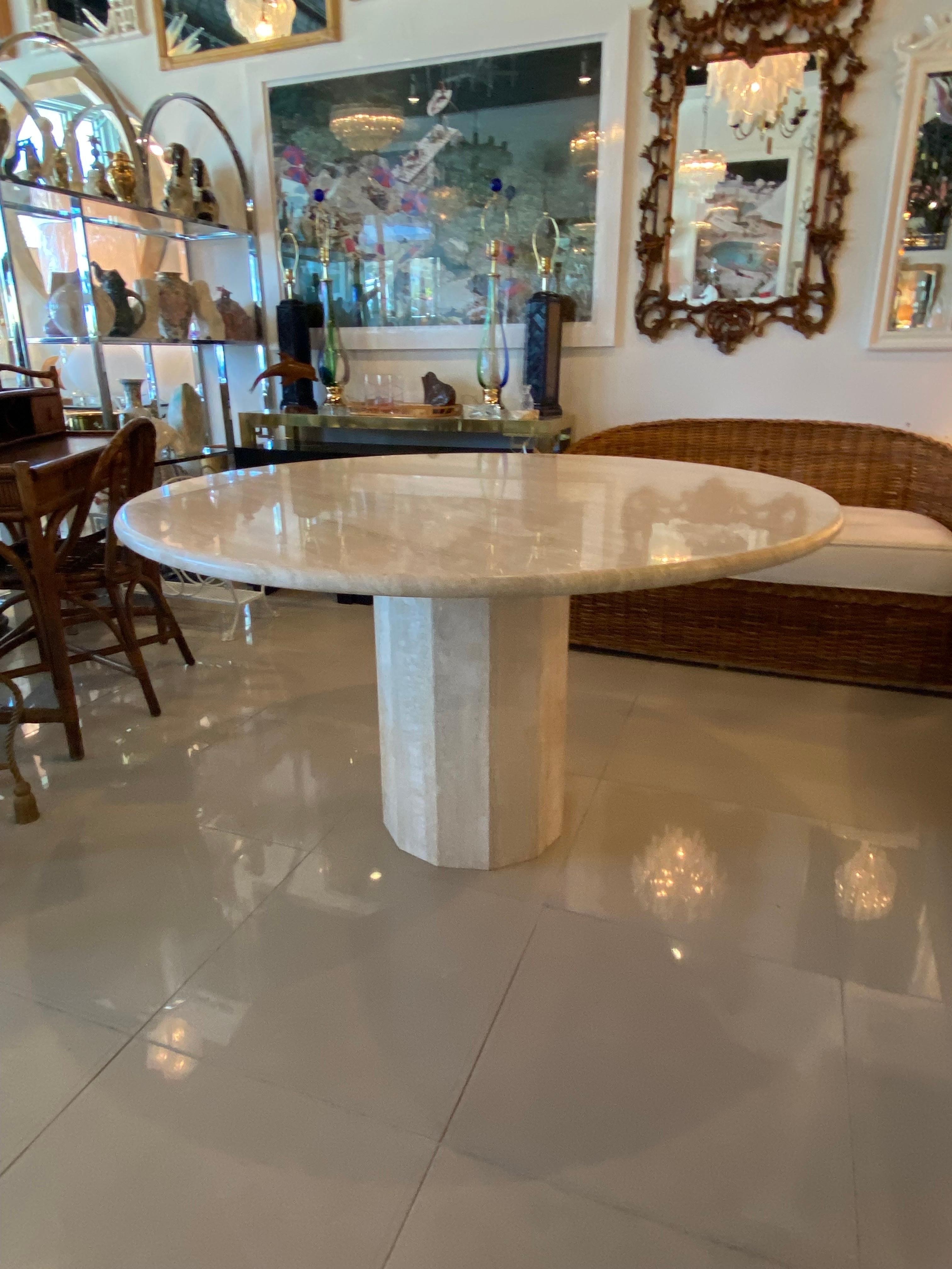 Vintage travertine stone round circular dining table or game table, 12 sided base. No chips or breaks. Marked Made in Italy on bottom by Stone International.