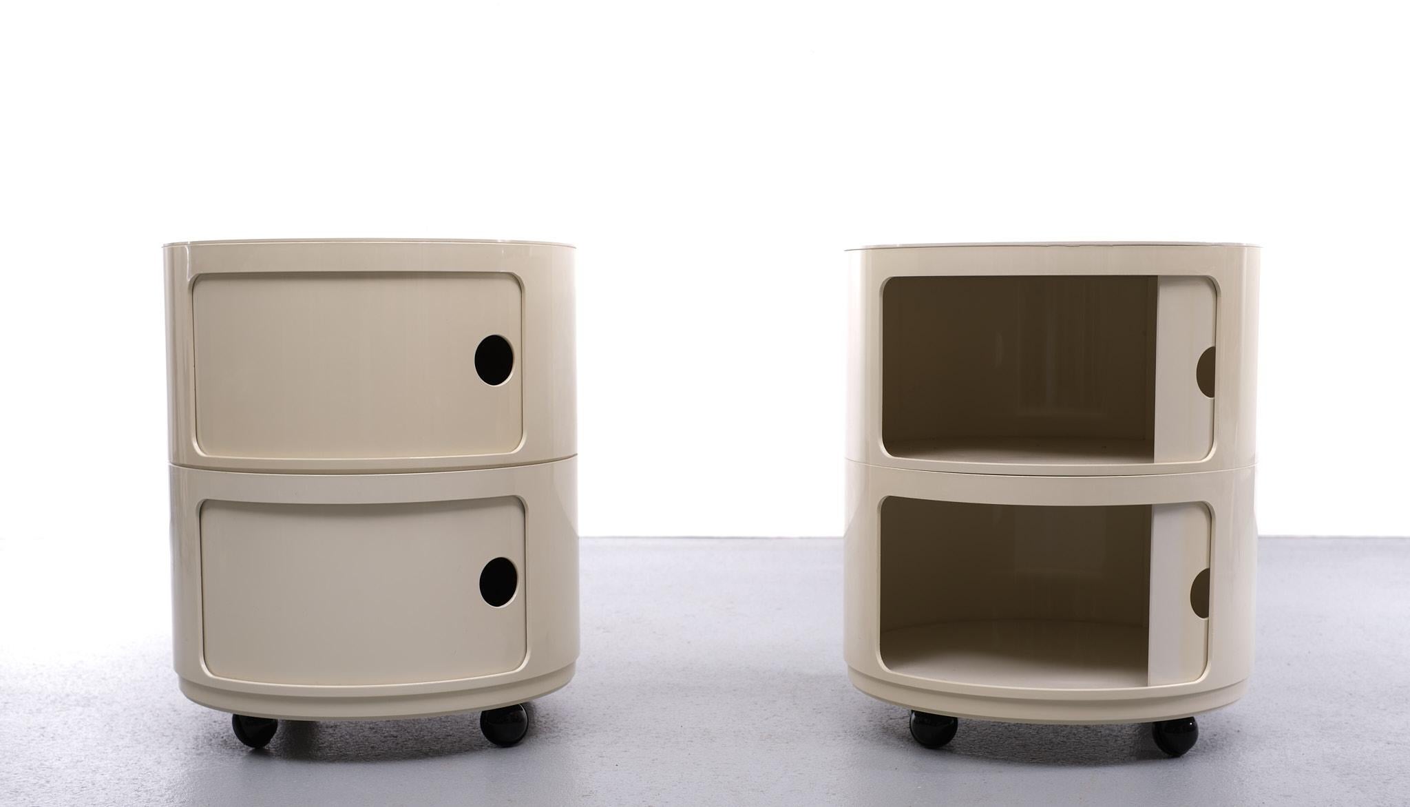 Round modulair Componibili Classic on wheels designed by Anna Castelli Ferrieri for Kartell in 1969. Each cabinet consists of two stacked elements, each with a sliding door, the lower one with wheels. Marked: Kartell Binasco, Milano, Designer Anna