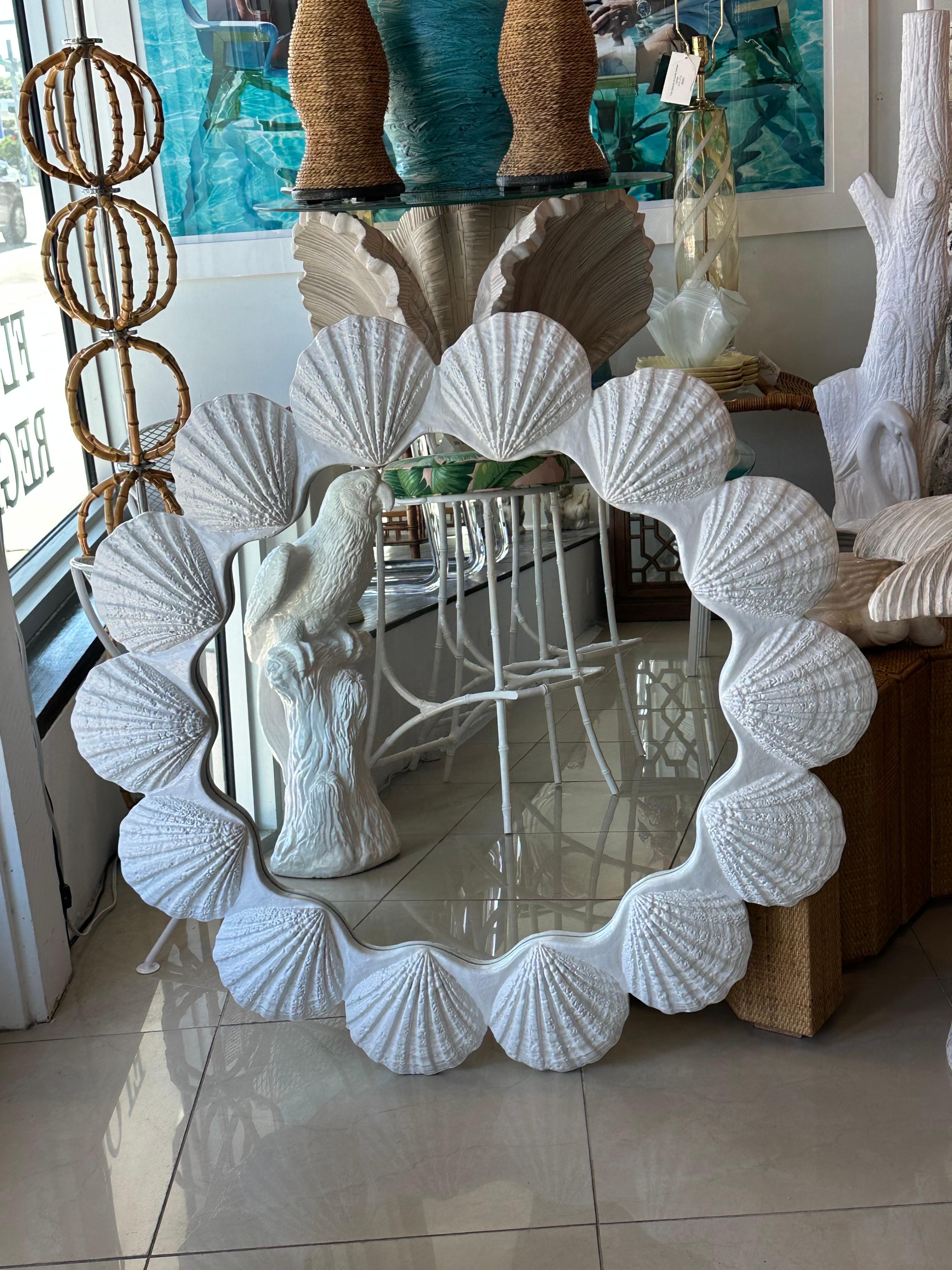 Beautiful vintage seashell shell scalloped wall mirror newly lacquered in white. Dimensions: 42 D x 2 D. Pair Available. Listed Separately. 