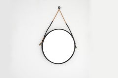 Vintage round mirror in steel, Italy 1970s.