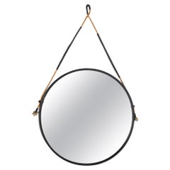 Vintage round mirror in steel, Italy 1970s.