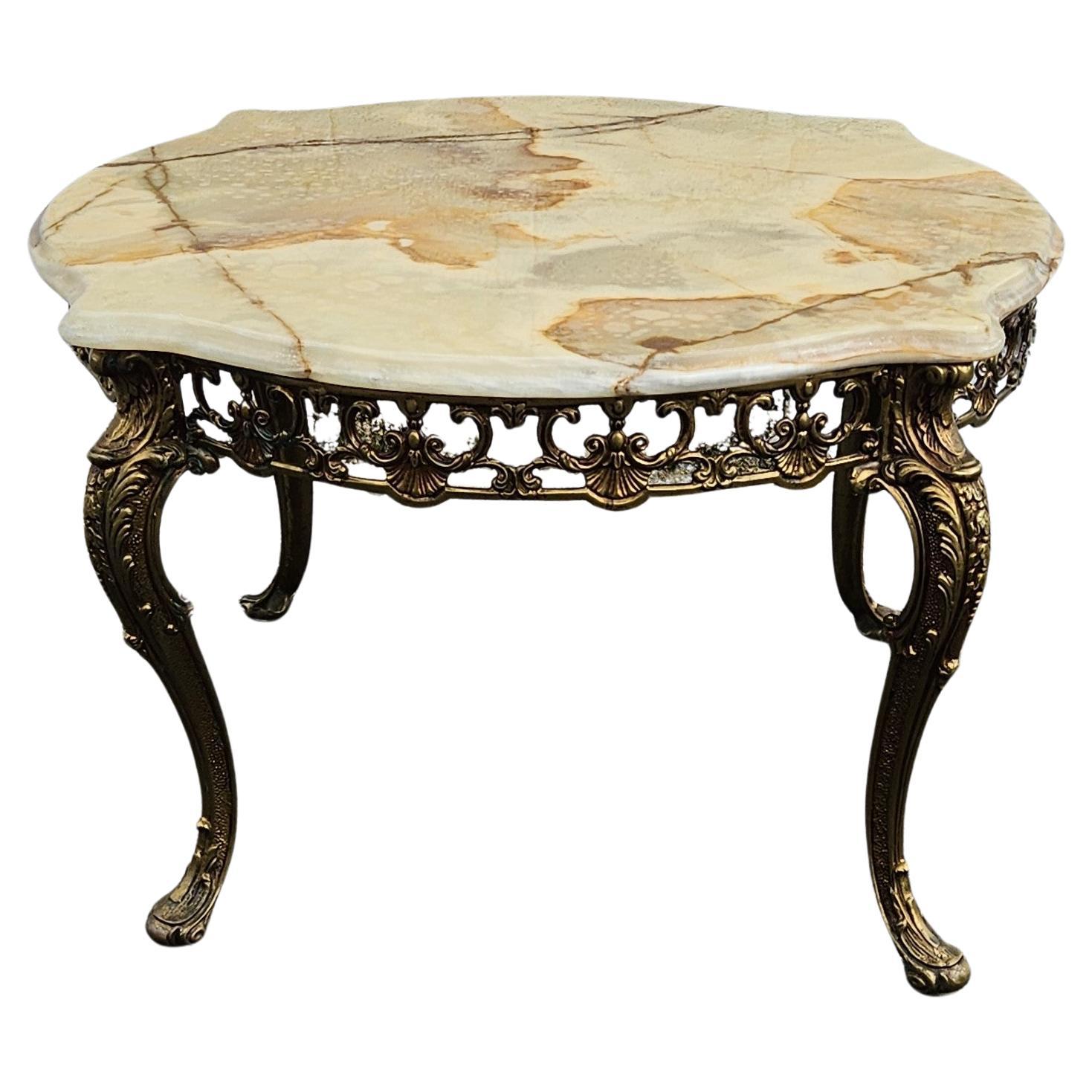 French Vintage Onyx Marble and Bronze Coffee Table -Vintage Cocktail Table-Style Louis XV from the 60s
Solid large marble top with a beautiful play of colors with natural pattern - clouds of yellow, beige, orange, brown and a touch of jade green.