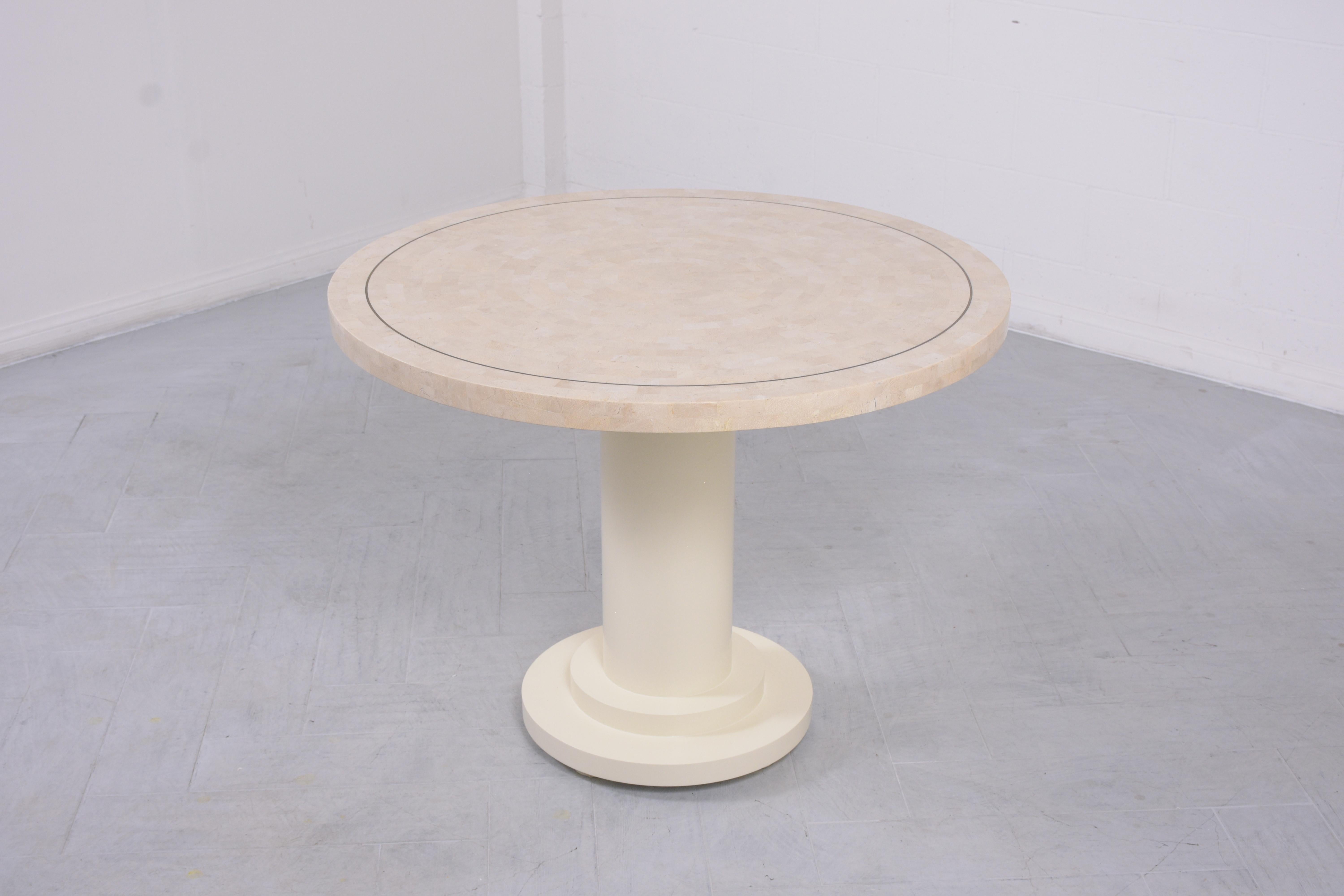 Step back in time with our stunning 1960s mid-century modern dining table, a testament to exquisite craftsmanship and timeless design. This extraordinary table, handcrafted from stone, is in great condition and has undergone meticulous restoration