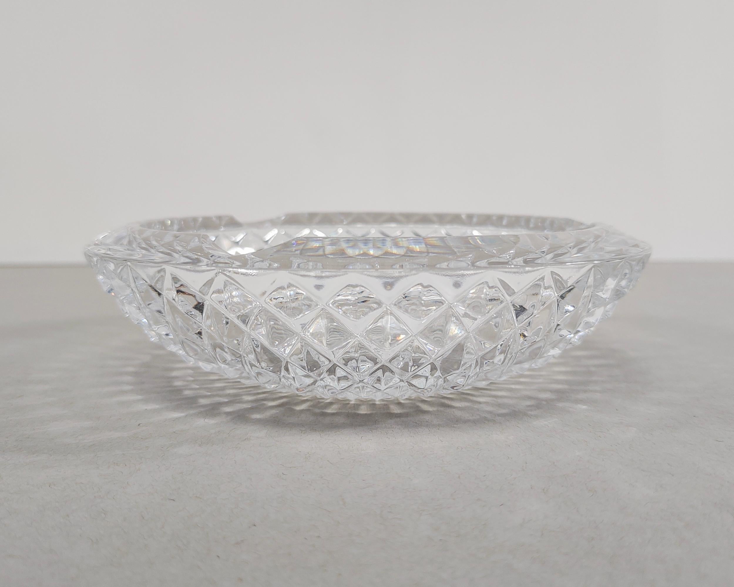 Vintage crystal ashtray circa 1960 with studded design that cascades down exterior. Three cigar-size notches around the rim. Overall great condition, a few tiny chips unnoticeable to the eye that can only be detected by touch.

6.5