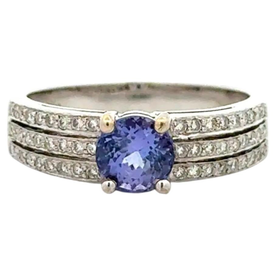 Vintage Round Tanzanite and Diamond Gold Solitaire Band Ring (Bague solitaire en or avec tanzanite ronde et diamant)