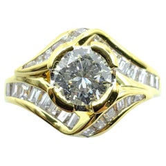 Vintage Round & Tapered Baguette Cut Diamond Engagement Ring in 18K Yellow Gold