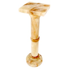 Piedistallo vintage rotondo in onice tornito