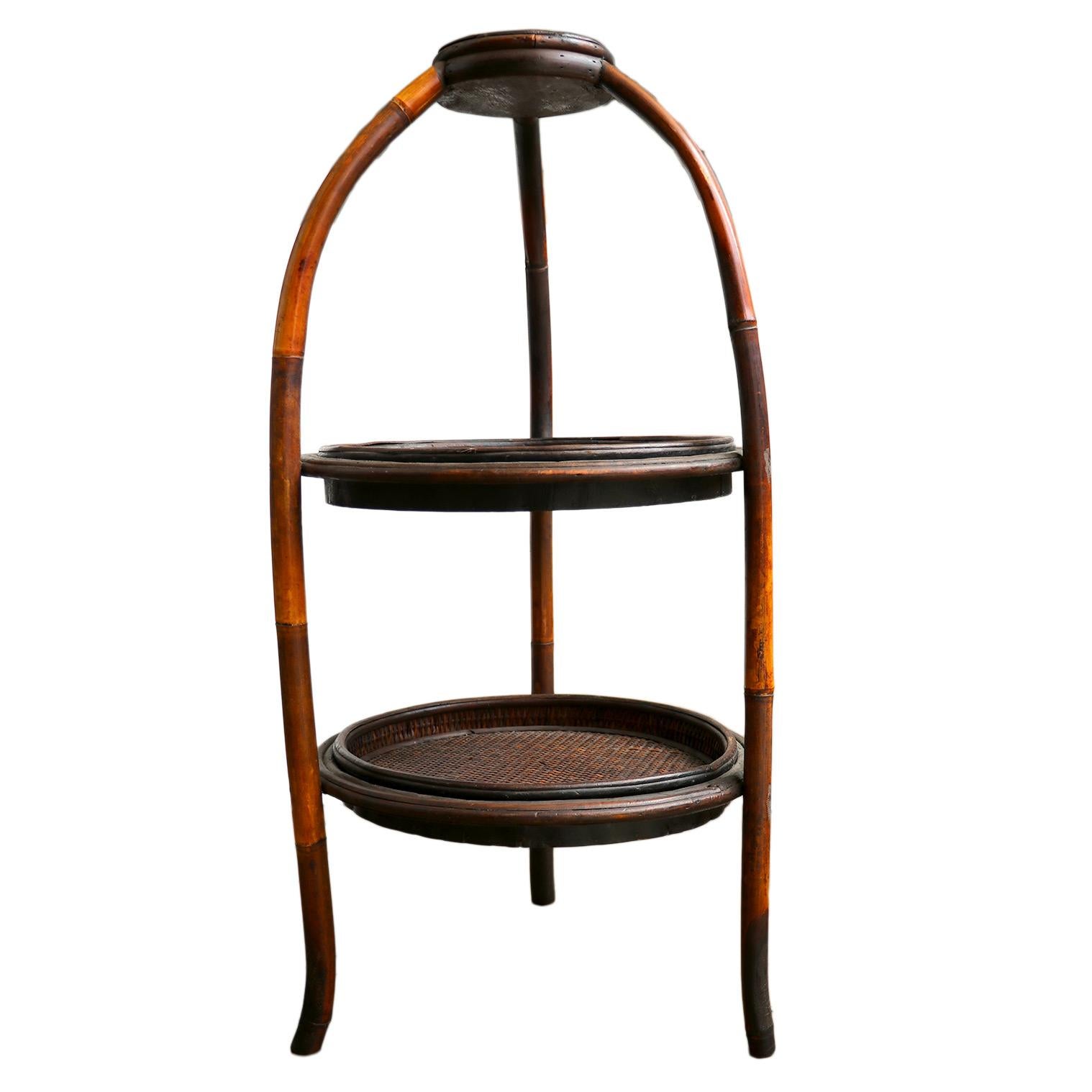 This charming vintage end table features two circular tiers, providing ample space to showcase your favorite decor pieces or simply store everyday essentials. The top tray offers a clearance of 11.5 inches, while the bottom tray offers 8.5 inches,