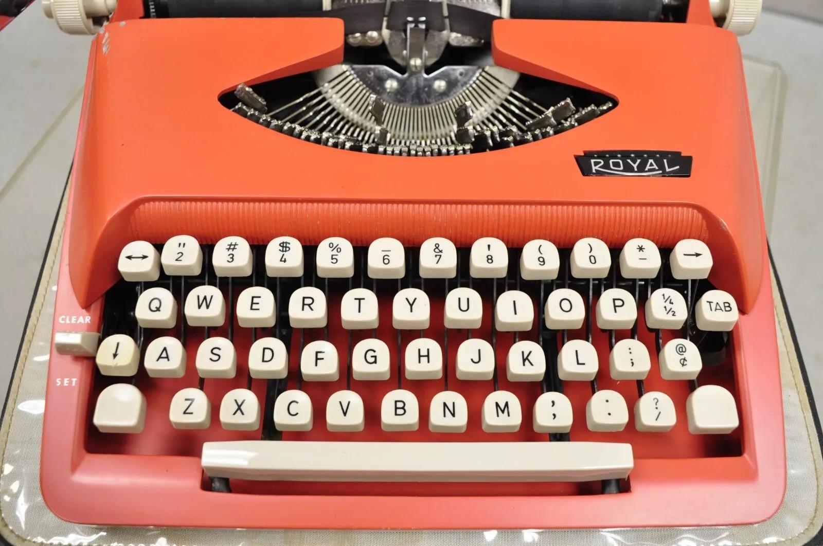 Vintage Royal Holland Parade Coral Red Mid Century Modern Typewriter in Case In Good Condition For Sale In Philadelphia, PA