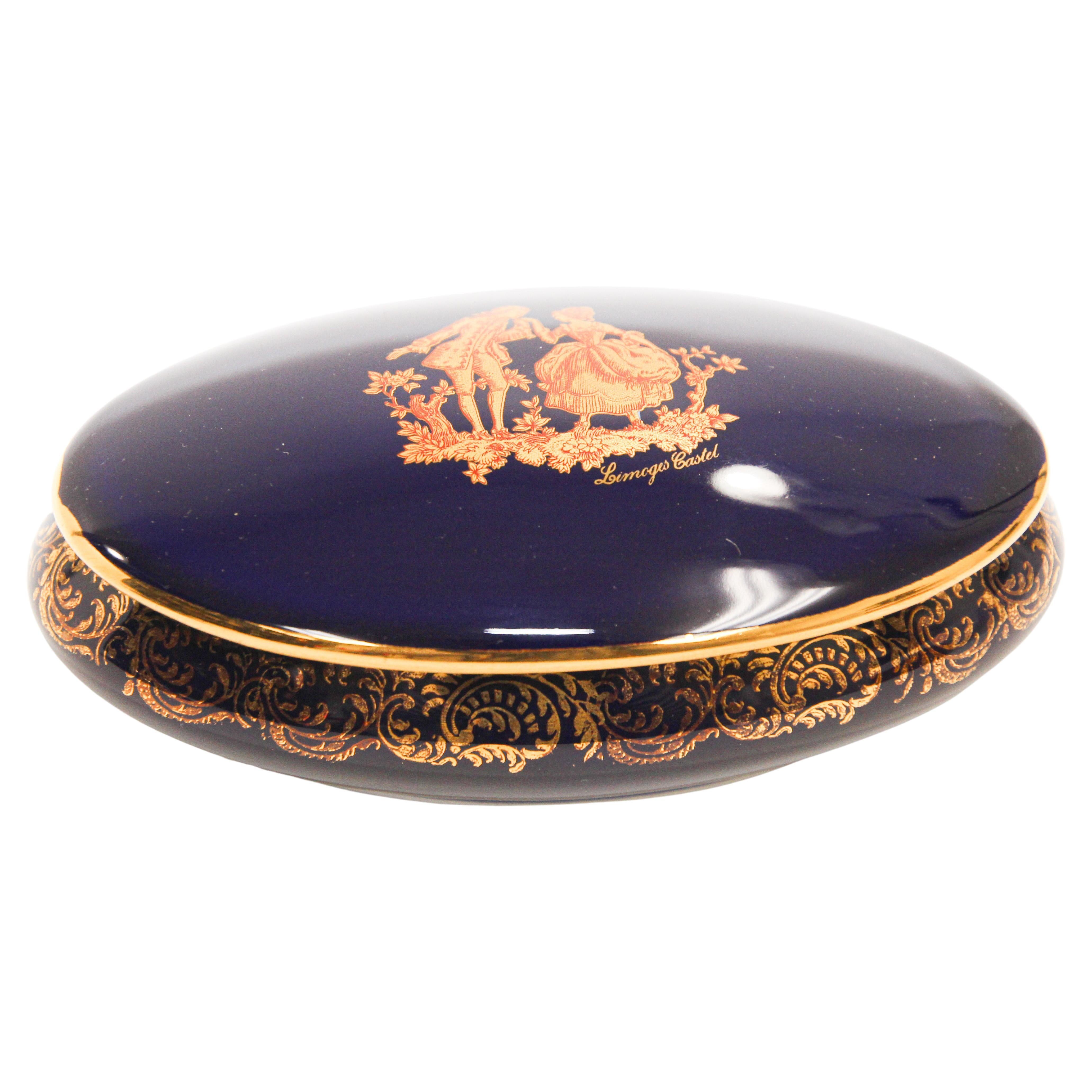 porcelain jewelry dish with cobalt blue design and 22k gold rim