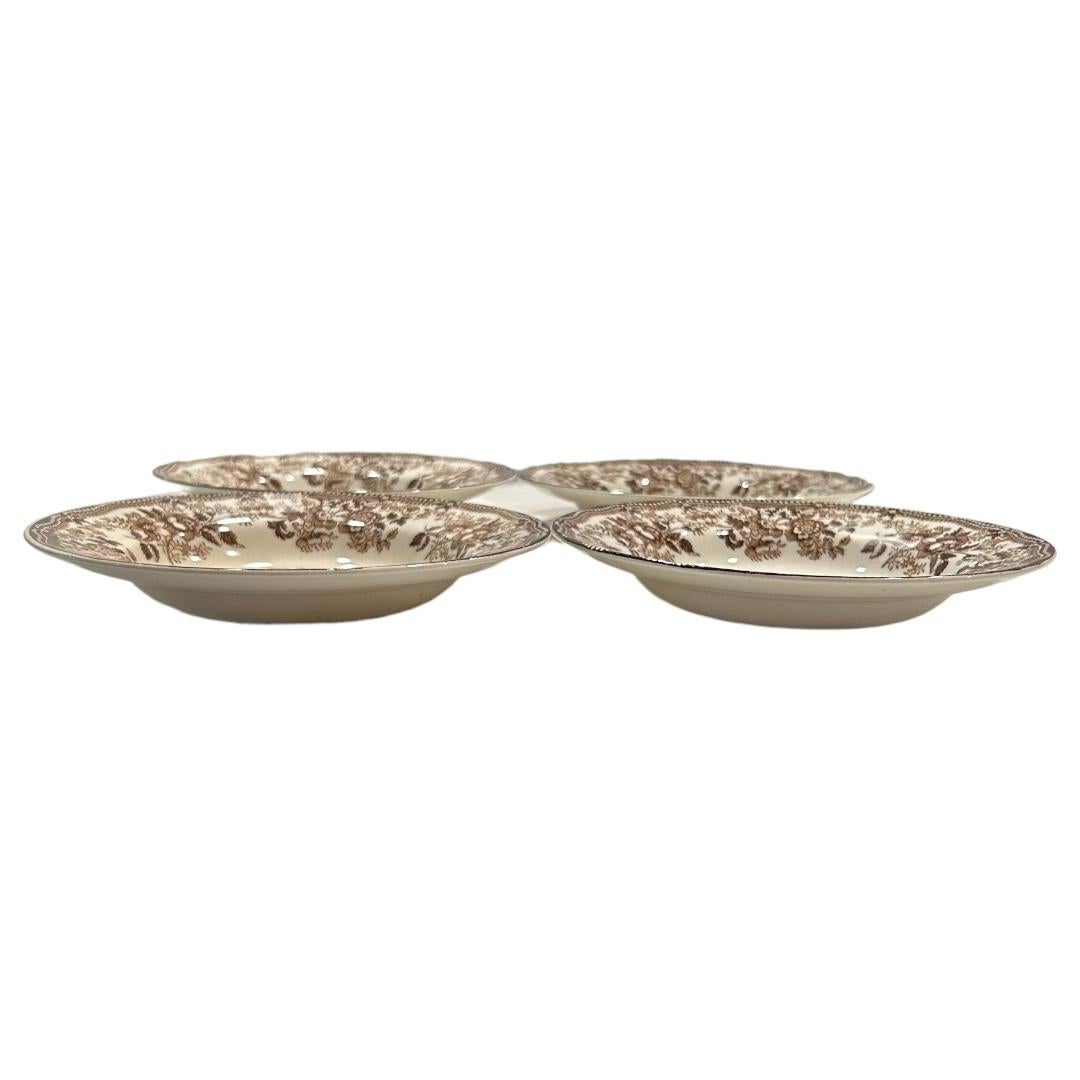 Excellent condition ~ no chips or cracks Note: natural crazing due to age; these ceramic serving bowls by Clarice Cliff is part of her Tonquin Collection; brown/cream in color; beautiful natural landscape in center with a flourishing flower border;