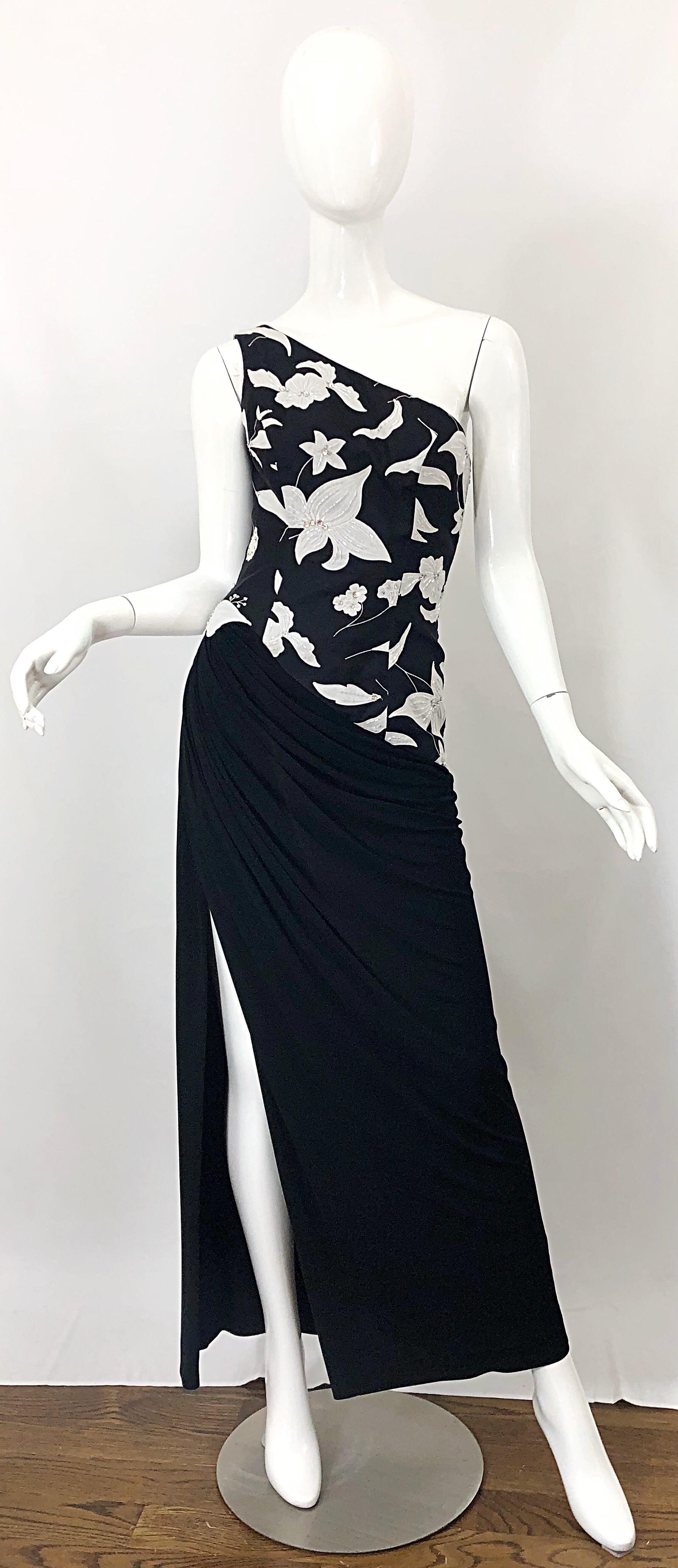 Beautiful vintage early 1980s RUBEN PANIS black and white abstract print silk rayon one shoulder beaded and sequin evening gown! This dress features a fitted bodice with abstract floral print. Hundreds of hand-sewn sequins and beads throughout the