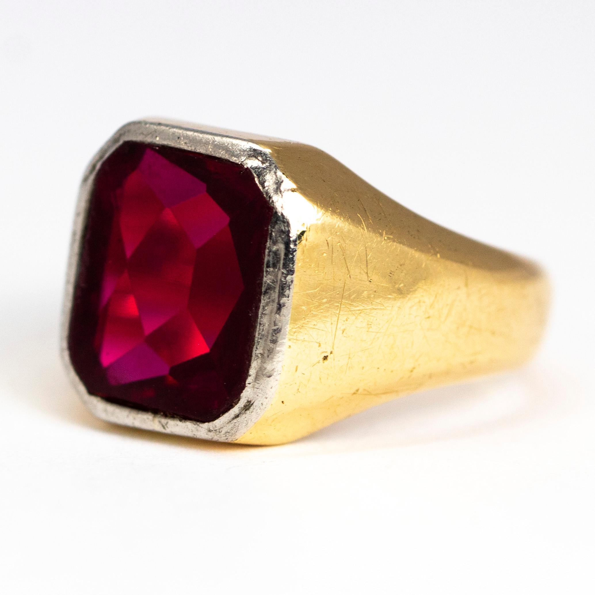 This show stopping ruby ring catches the light beautifully. This ring in sure to get you noticed with a large ruby which, as you can see in the pictures, is a gorgeous deep pink colour. The stone is set in platinum and the rest of the ring is