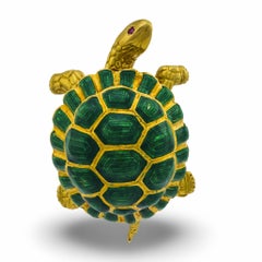 Broche tortue vintage en or jaune 18k avec rubis