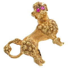 Broche caniche vintage de rubí y oro amarillo de 18 quilates