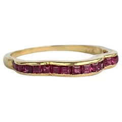 Bracelet 1/2 éternité vintage en rubis et or 18 carats