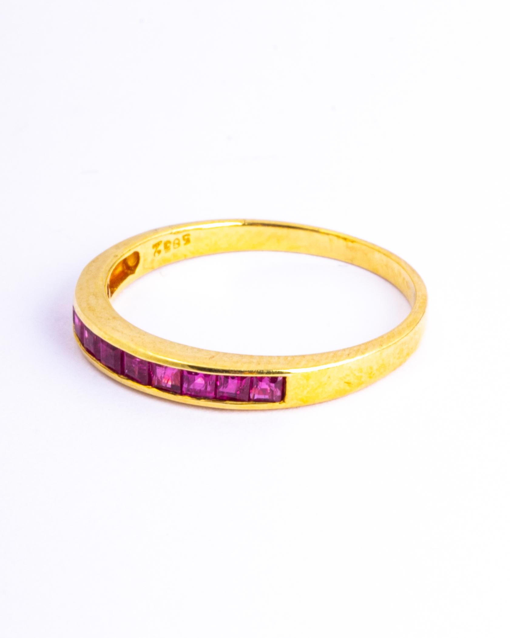 The rubies set within this 9ct gold band are square cut and total approx 50pts. They have a great shine to them and are beautifully bright stones. 

Ring Size: M or 6 1/4 
Band Width: 2.5mm 

Weight: 1.54g