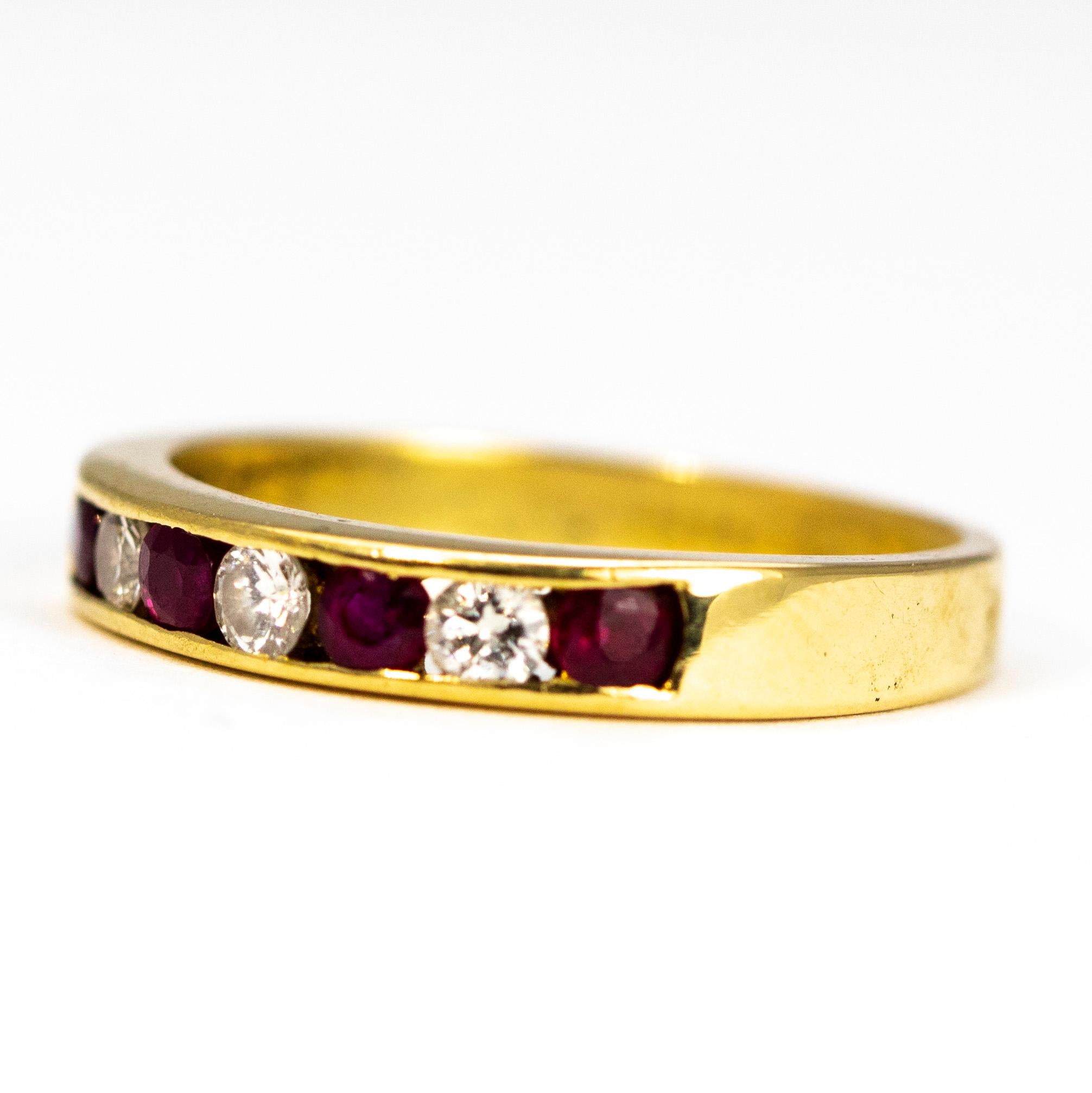 This wonderful half eternity holds round stones that are set in straight settings so you can see the whole edges of the stones. The rubies and diamonds measure 7pts each and there are four rubies and three diamonds.

Ring Size: O or 7 1/4
Band