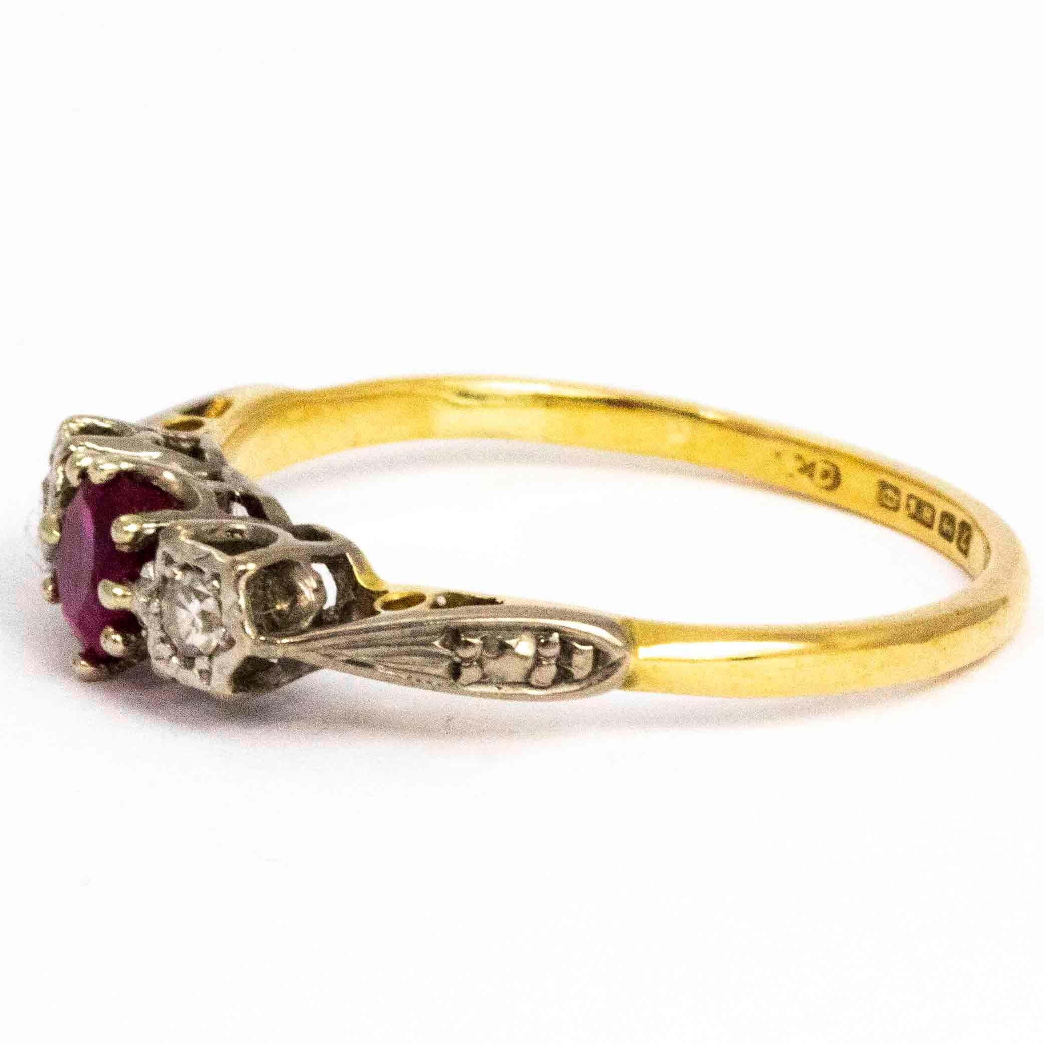 The ruby in this ring as the most wonderful deep pink colour which really pops next to the glistening diamonds. The ruby measures 25pts and the diamonds measure 5pts each. The diamonds and set in star settings and the ruby is held by a simple claw