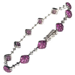 Pulsera vintage de oro blanco de 18 quilates con rubíes y diamantes