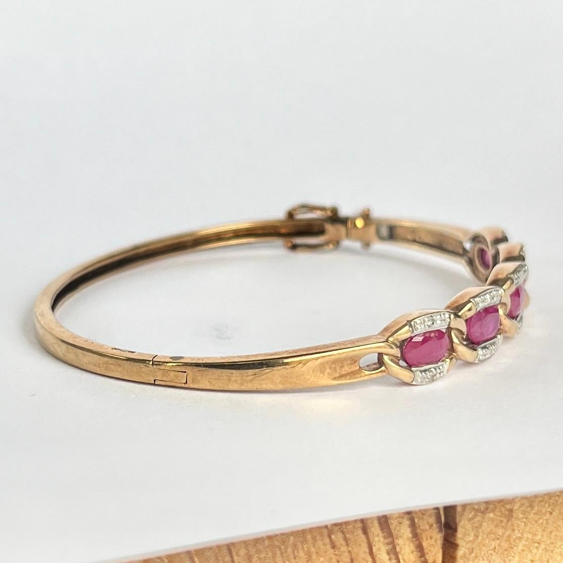 Vintage Ruby and Diamond 9 Carat Gold Bangle In Good Condition For Sale In Chipping Campden, GB