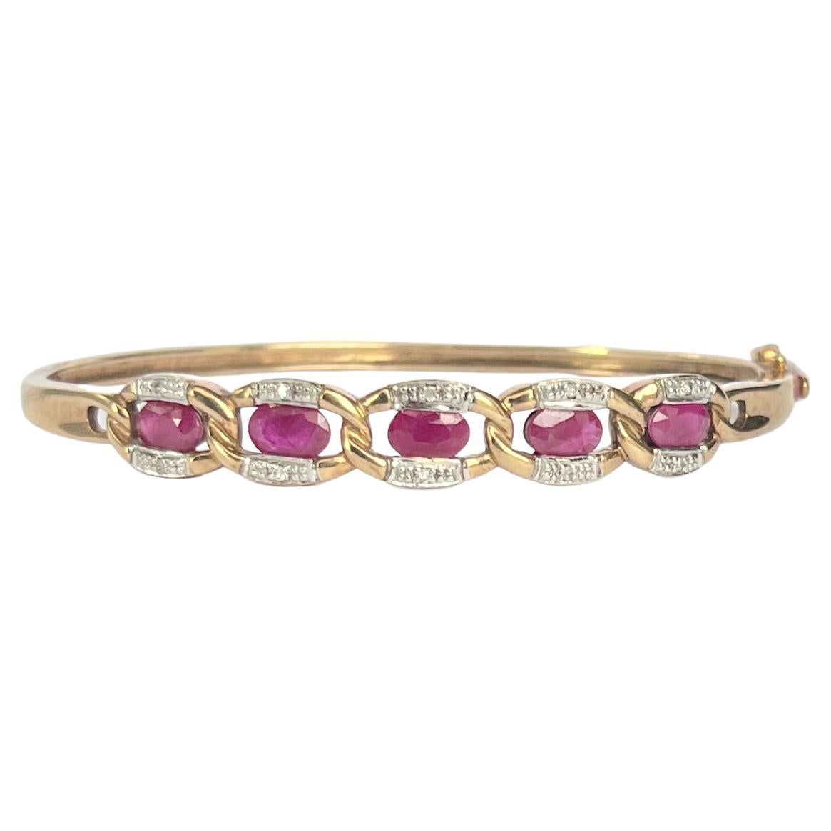 Bracelet jonc vintage en or 9 carats avec rubis et diamants