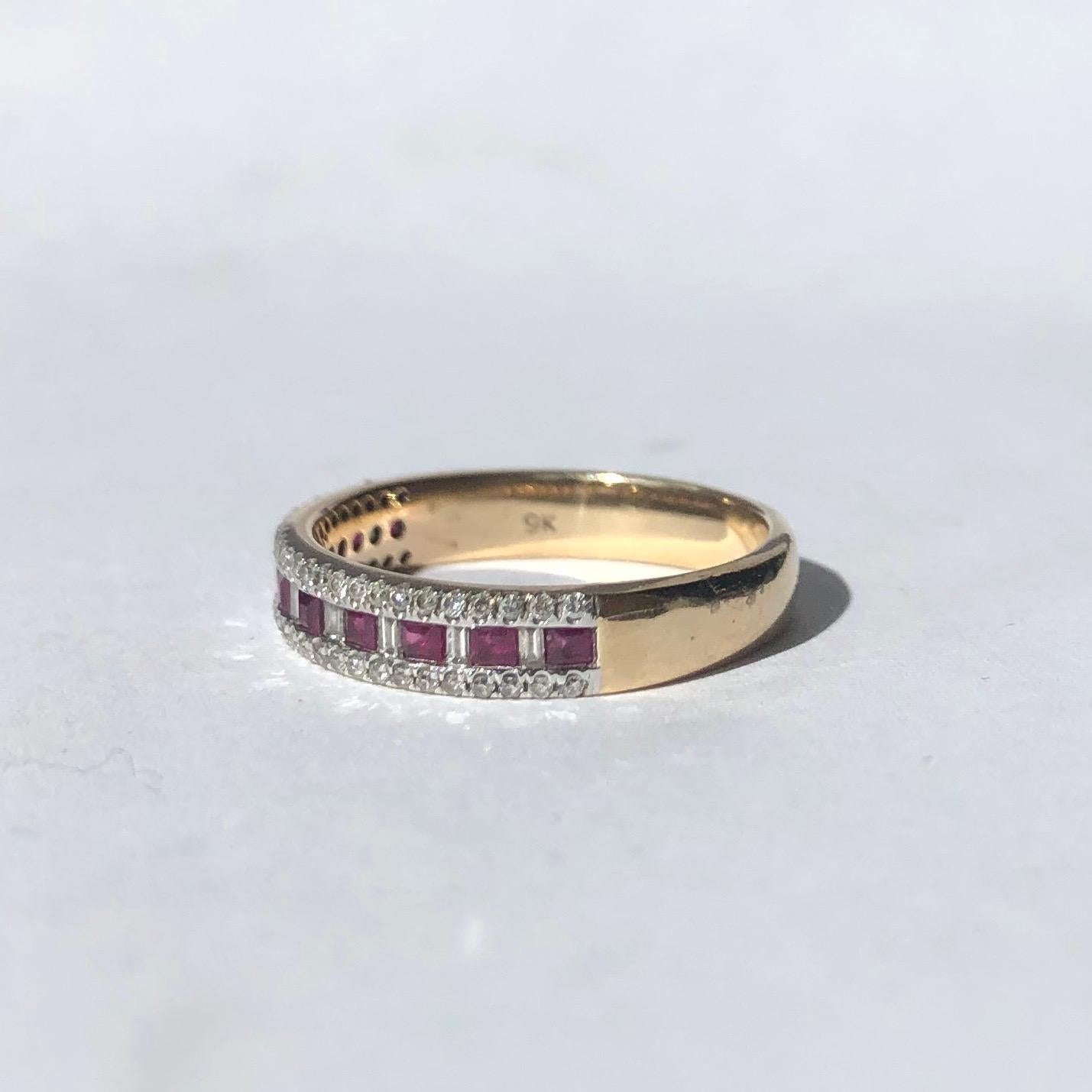 The stones are so gorgeous in this band. The rubies are square cut and total 50pts and in-between these red stones are emerald cut diamonds totalling 10pts. Either side of the strip of lovey stones are round brilliant cut diamond points all set in